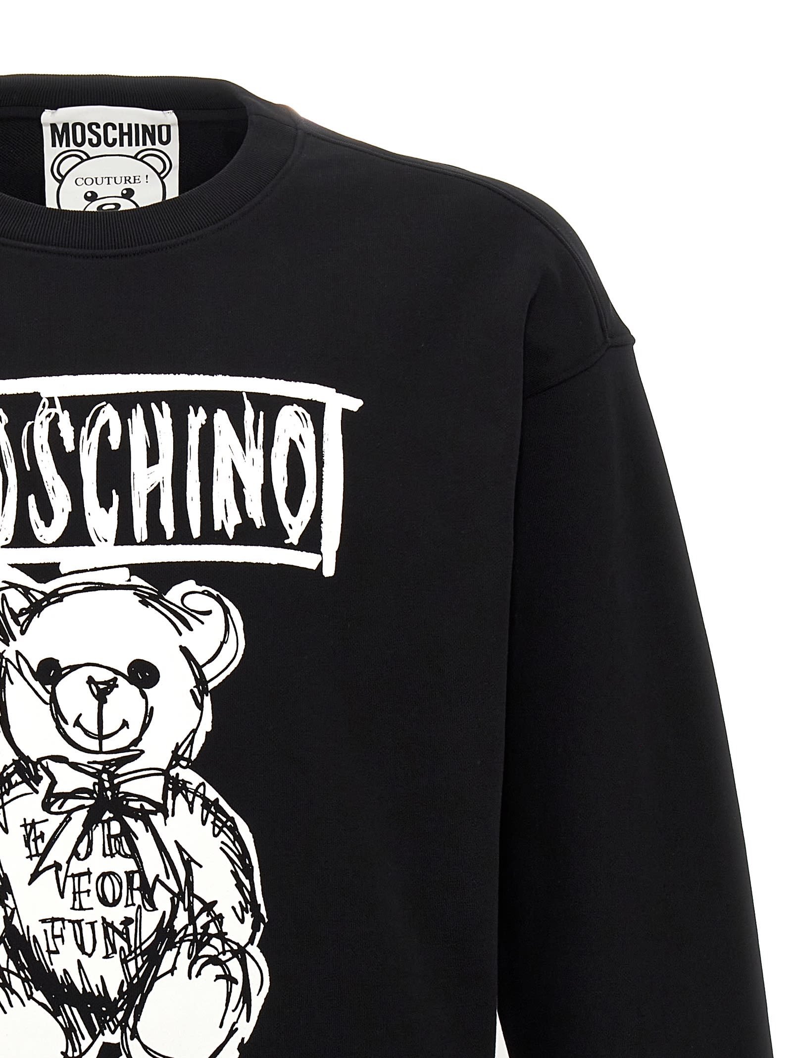 Shop Moschino Logo Print Sweatshirt In White/black