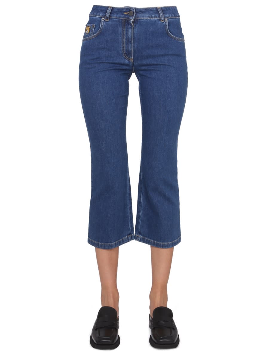 Shop Moschino Cropped Jeans In Blue