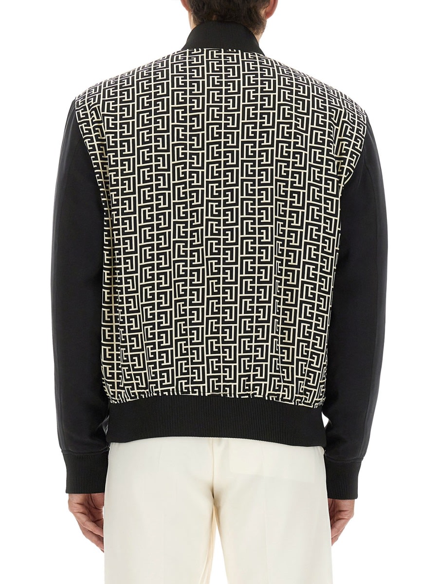 Balmain Monogrammed Varsity Jacket With Patches In Black