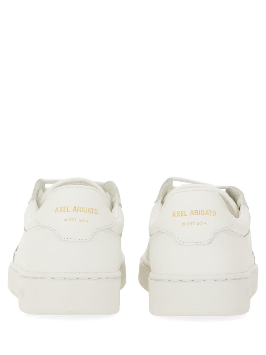 Shop Axel Arigato Sneaker Says It In White