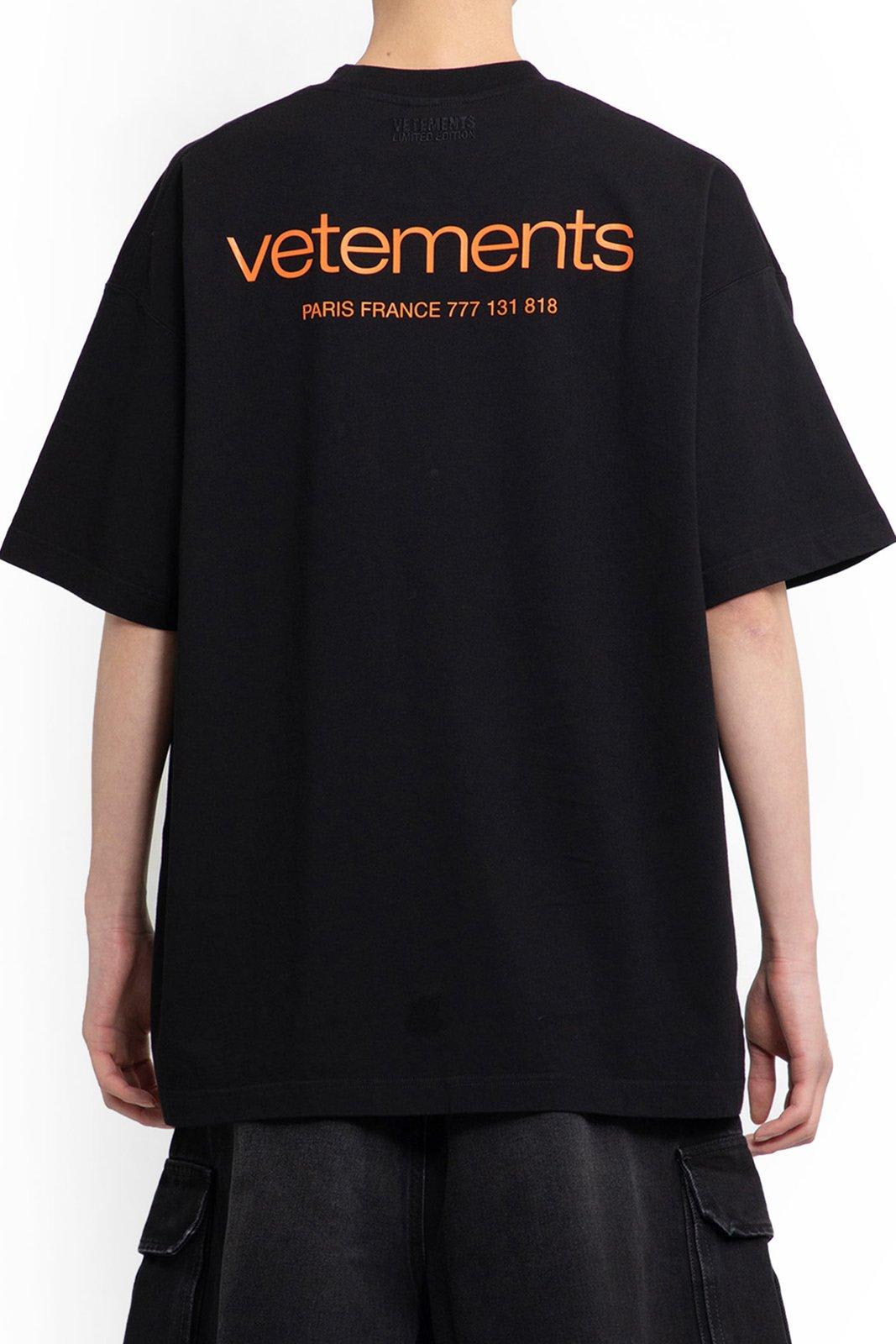 Shop Vetements Logo Printed Round Neck T-shirt In Black