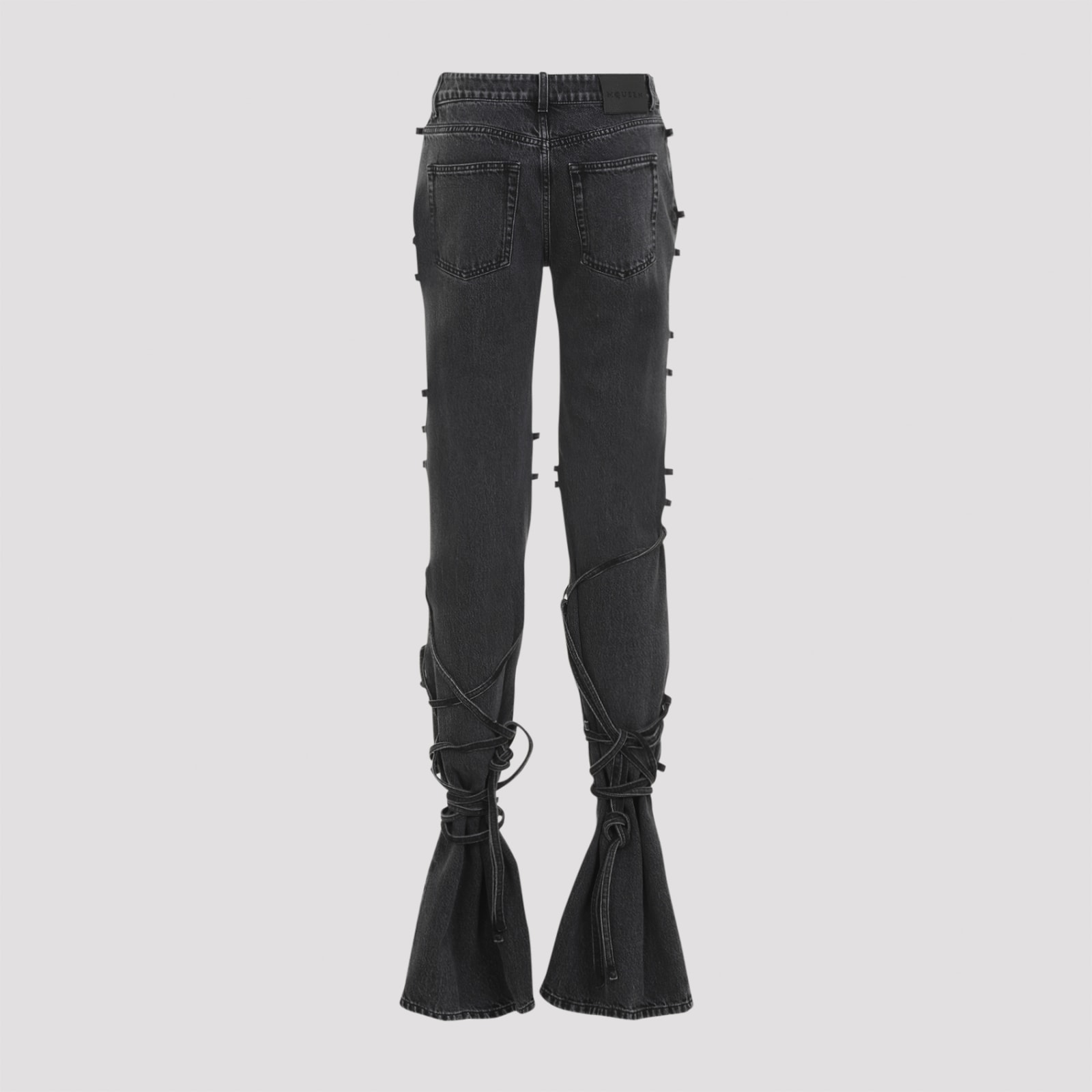 Alexander Mcqueen Mcqueen Wrapped Asymmetric Waist Jeans In Black Stonewashed