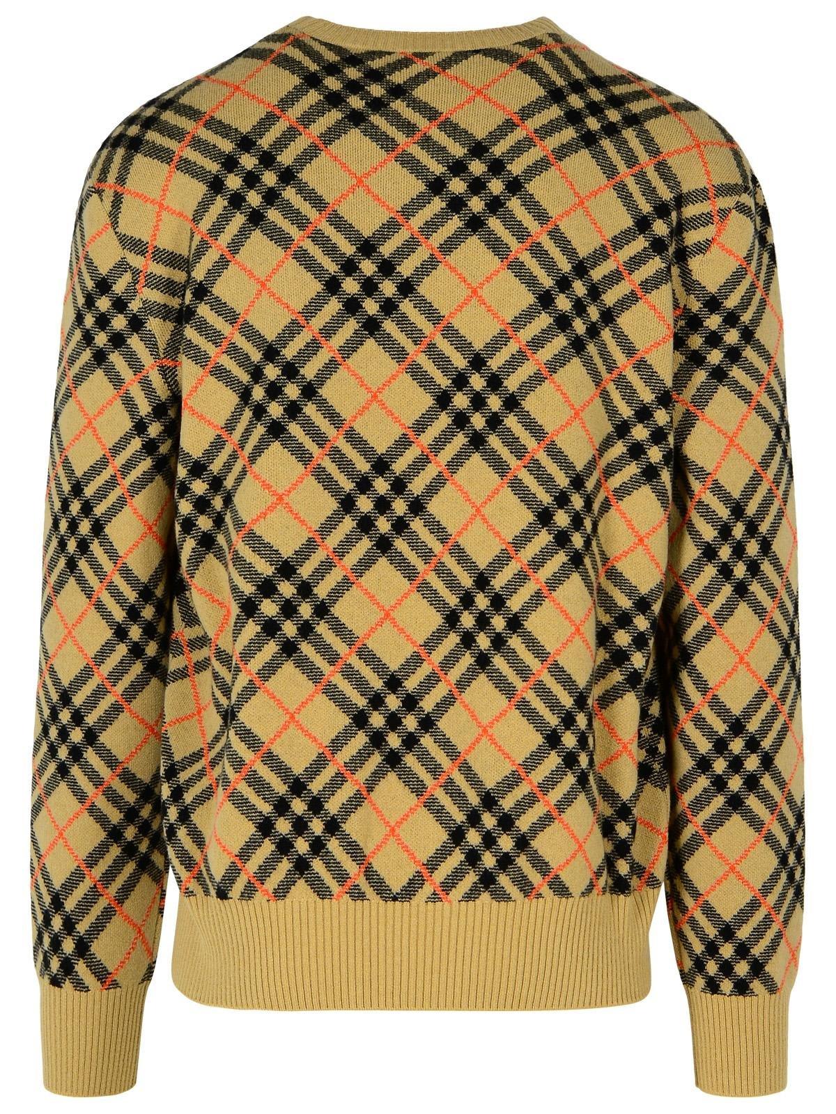 Shop Burberry Checked Knitted Crewneck Jumper In Beige