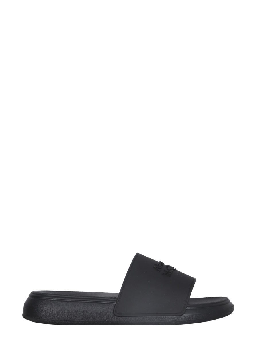 Shop Alexander Mcqueen Rubber Slide Sandals In Black