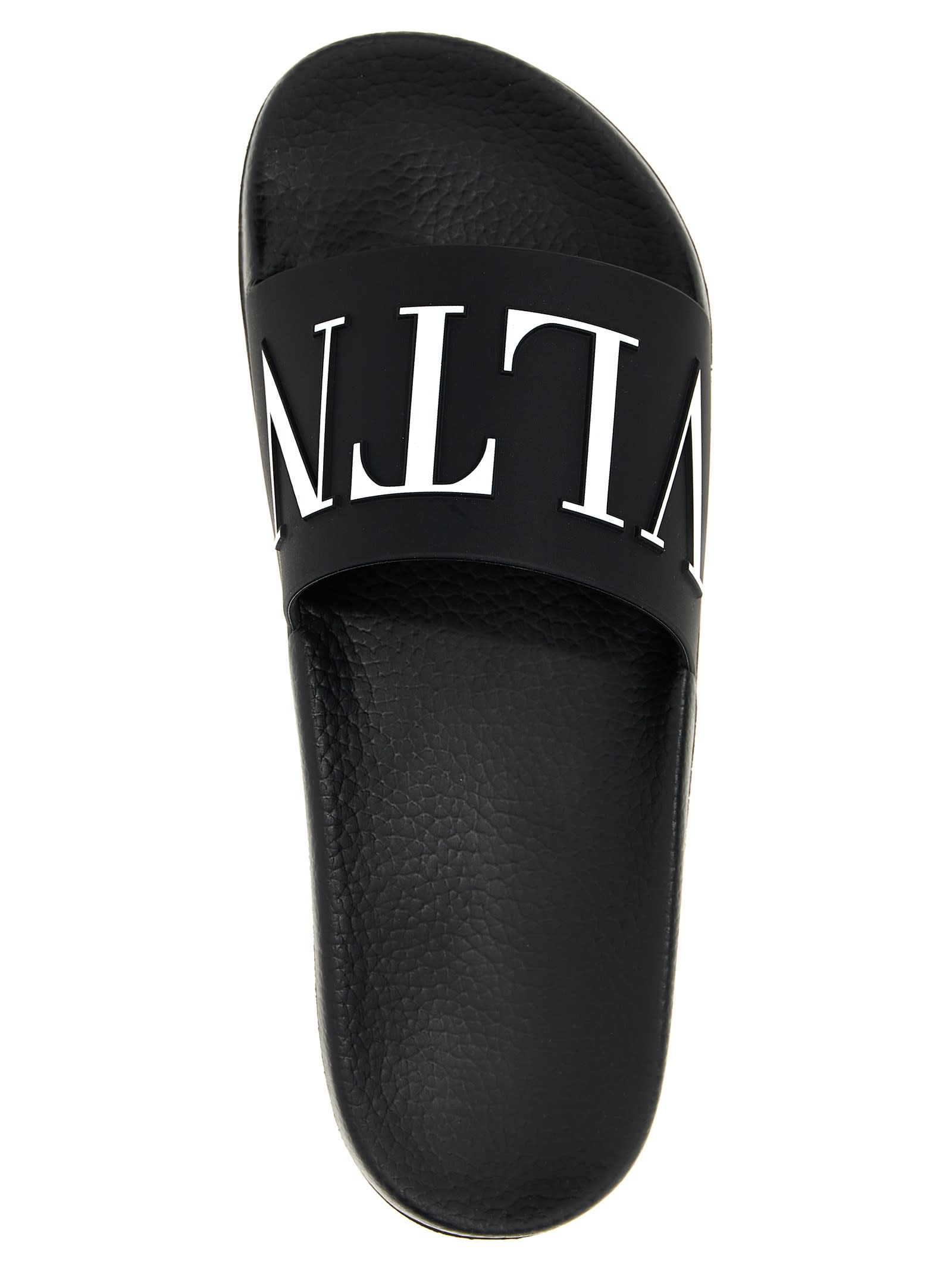 Shop Valentino Garavani Vltn Slides In White/black