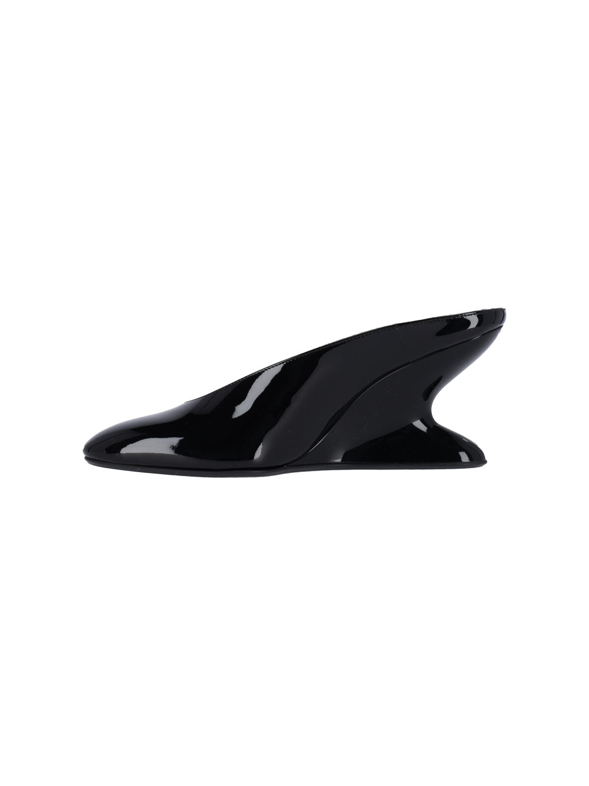 Shop Alaïa Mules With Curved Wedges