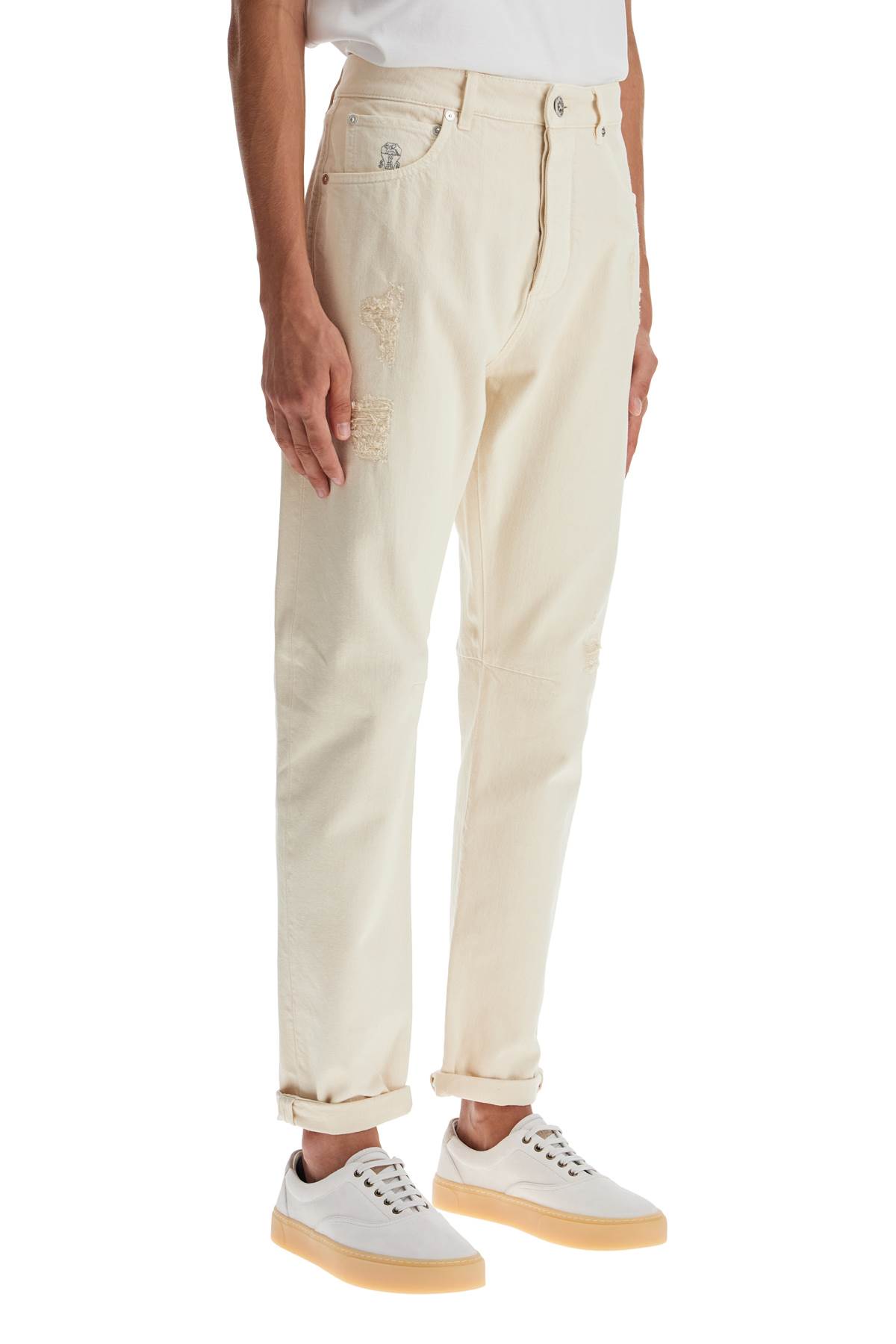 Shop Brunello Cucinelli Destroyed Leisure Fit Jeans With Distressed Details. In Off White