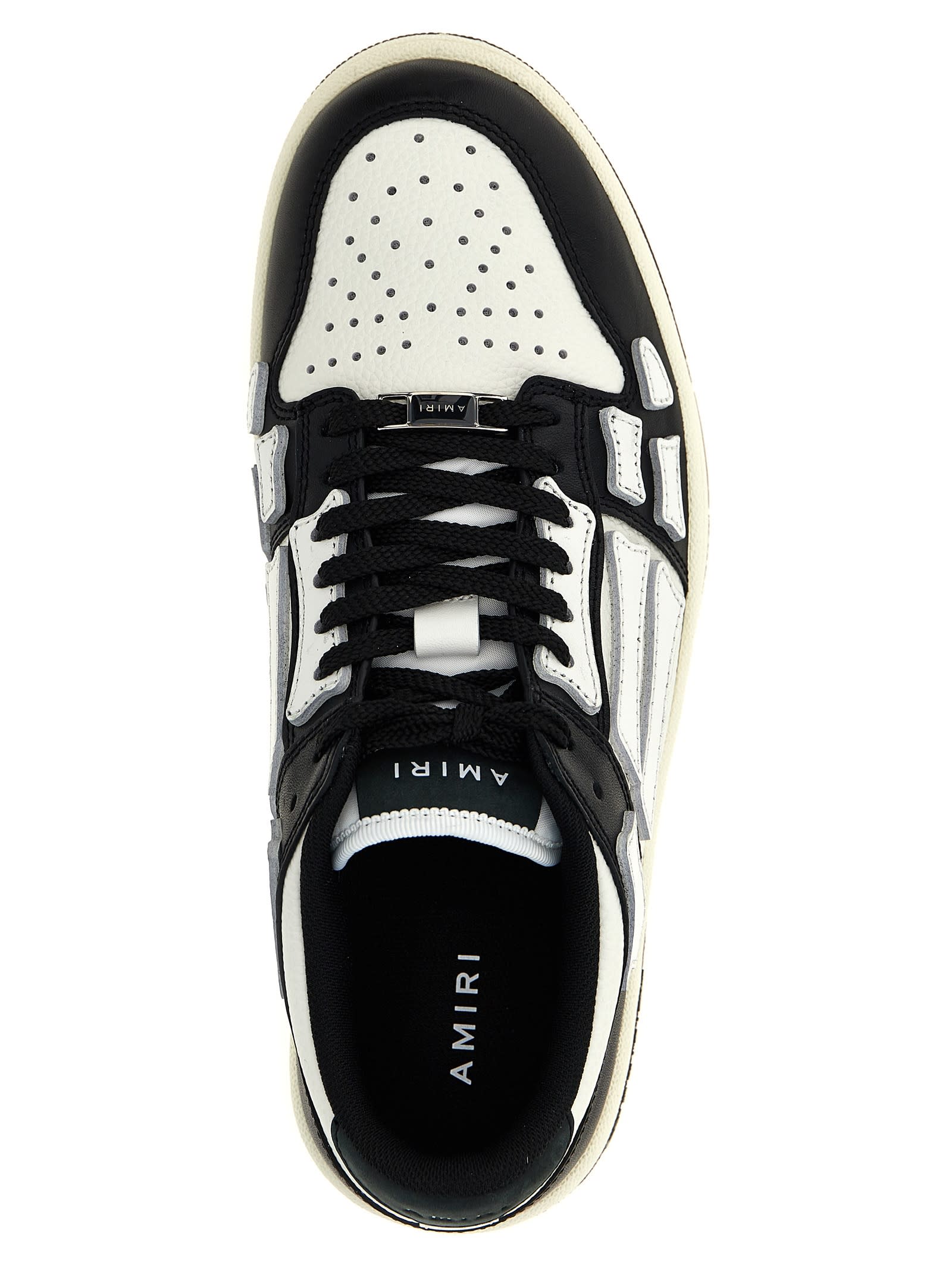 Shop Amiri Skel Top Low Sneakers In White/black