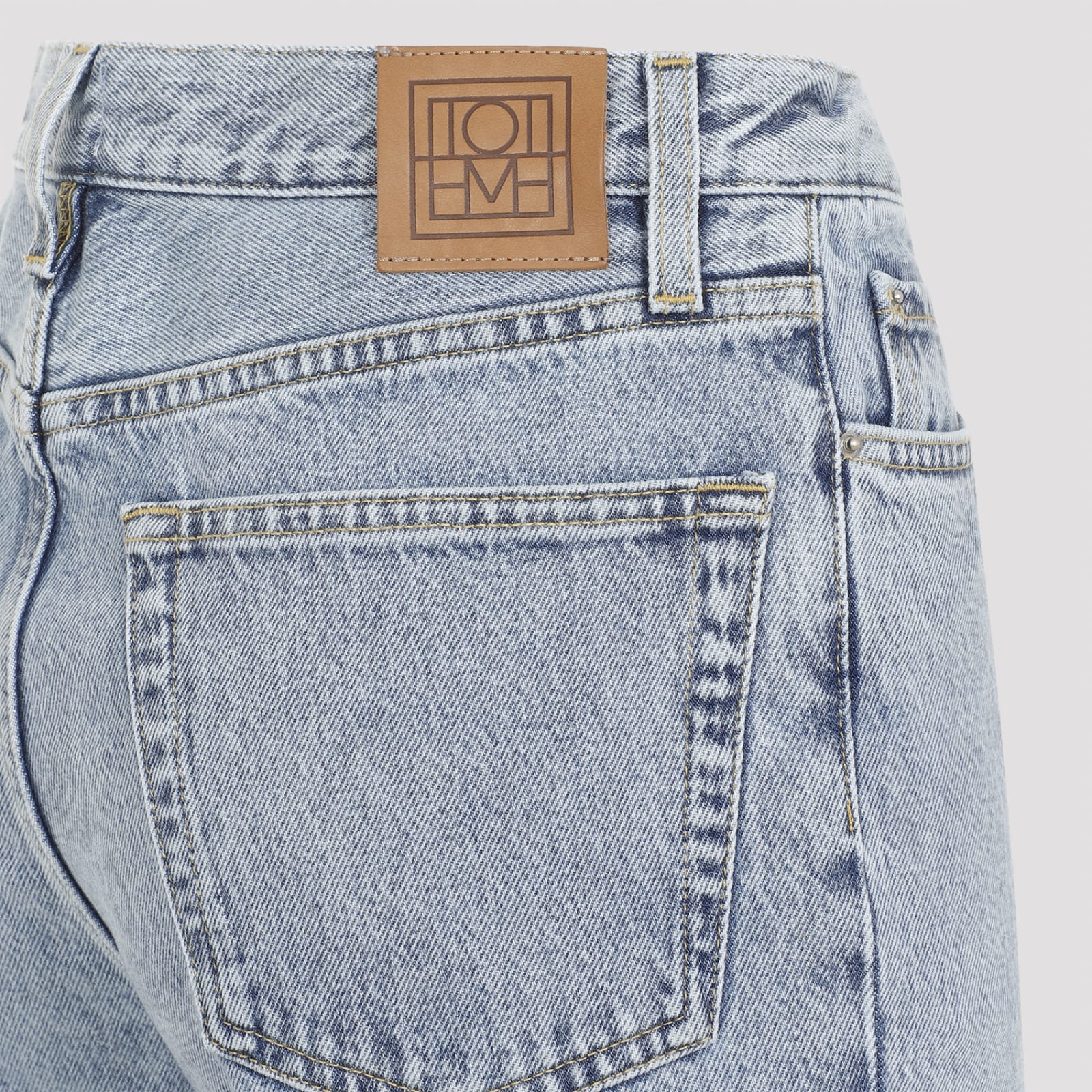 Shop Totême Classic Cut Jeans In Cool Blue