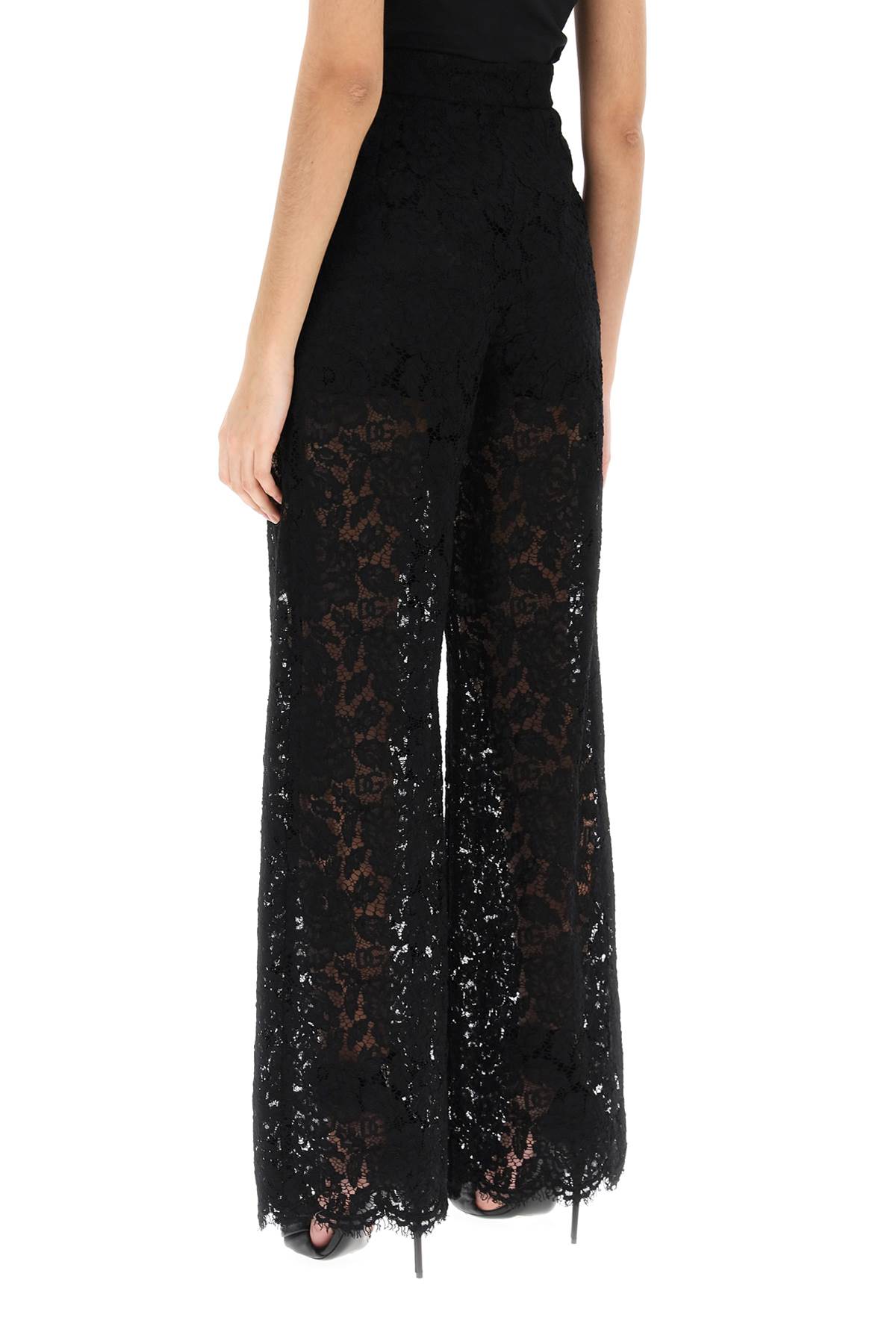 Shop Dolce & Gabbana Flared-leg Lace Pants In Black
