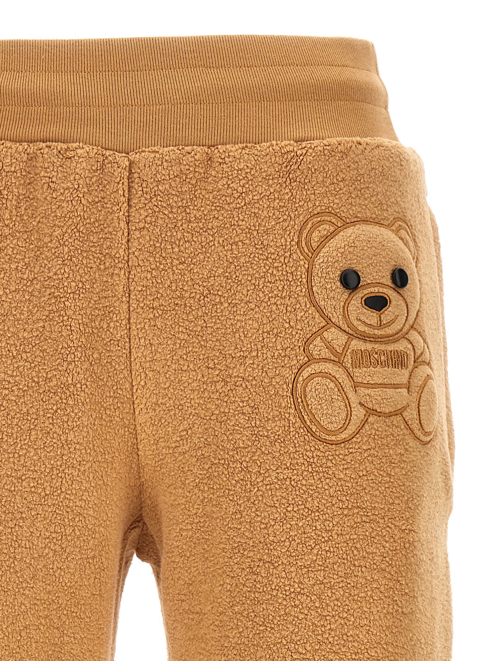 Moschino Teddy-bear Detail Cropped Trousers In Beige