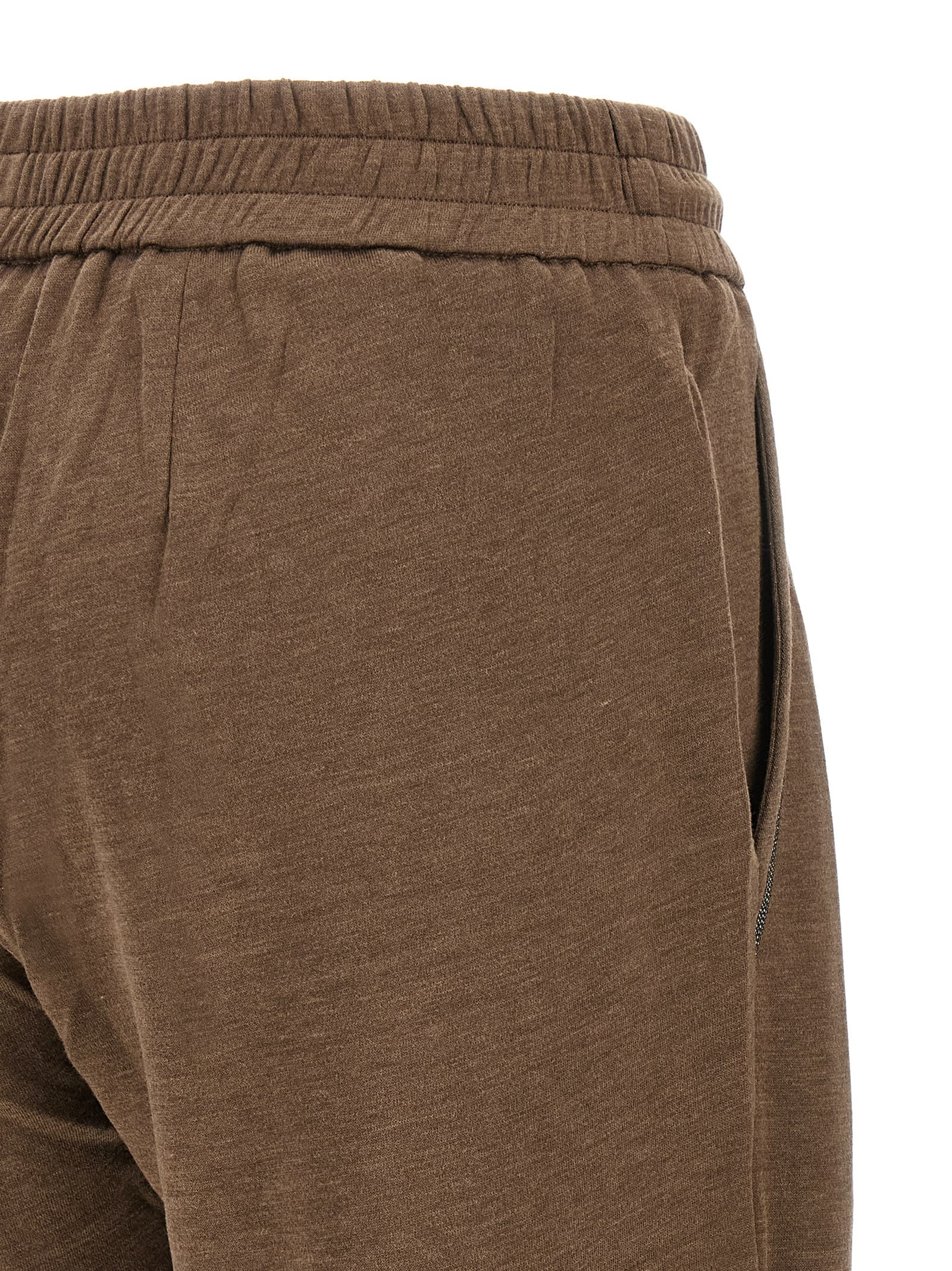 Brunello Cucinelli Shiny Pocket Detail Joggers In Brown