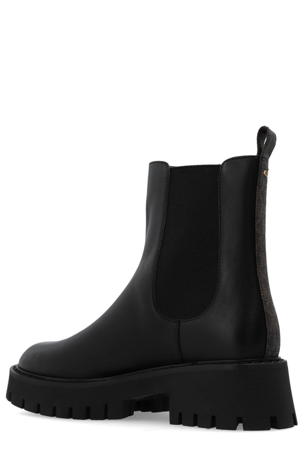 Shop Michael Kors Asher Ankle Boots In Brown Black