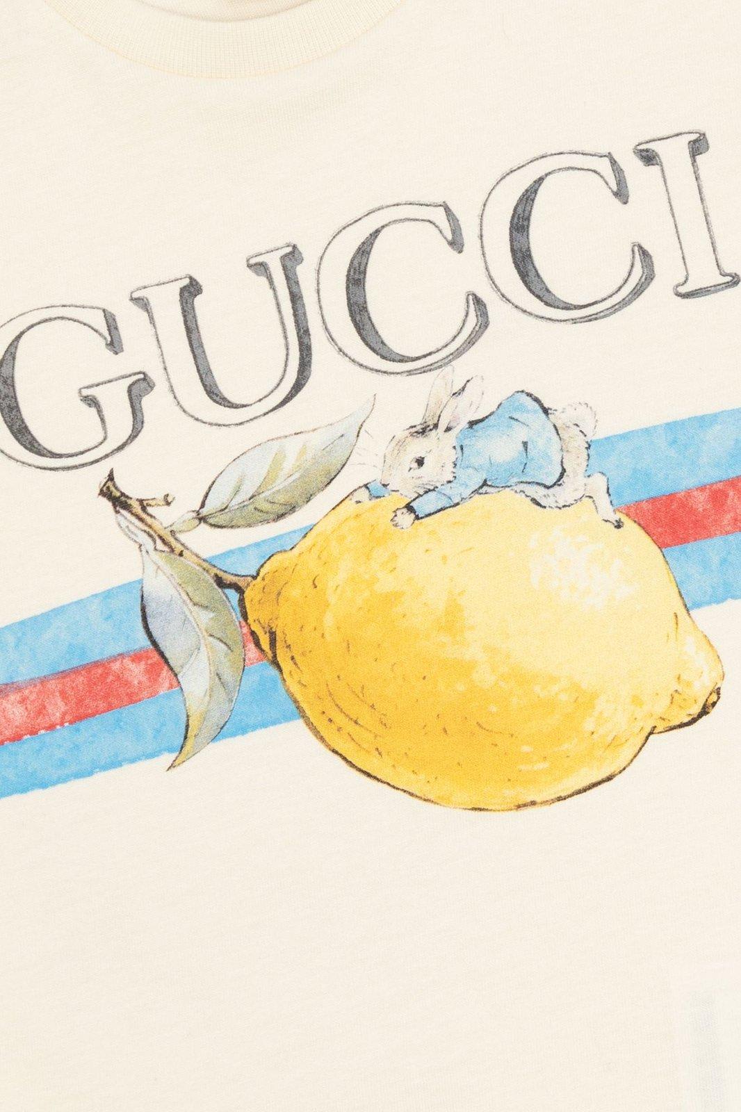 Shop Gucci Logo Printed Crewneck T-shirt In Yellow