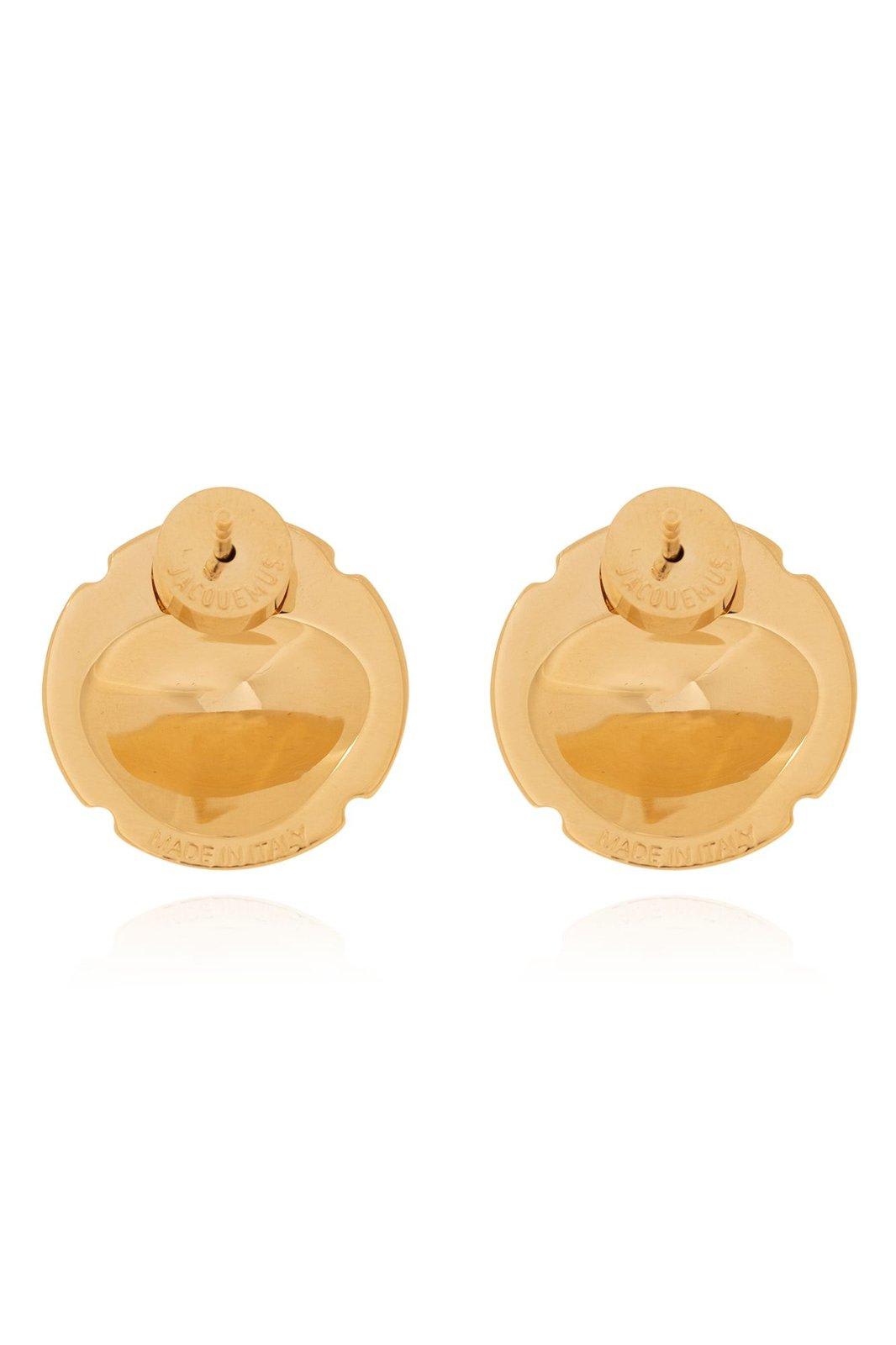 Shop Jacquemus Champagne Muselet Earrings In Golden