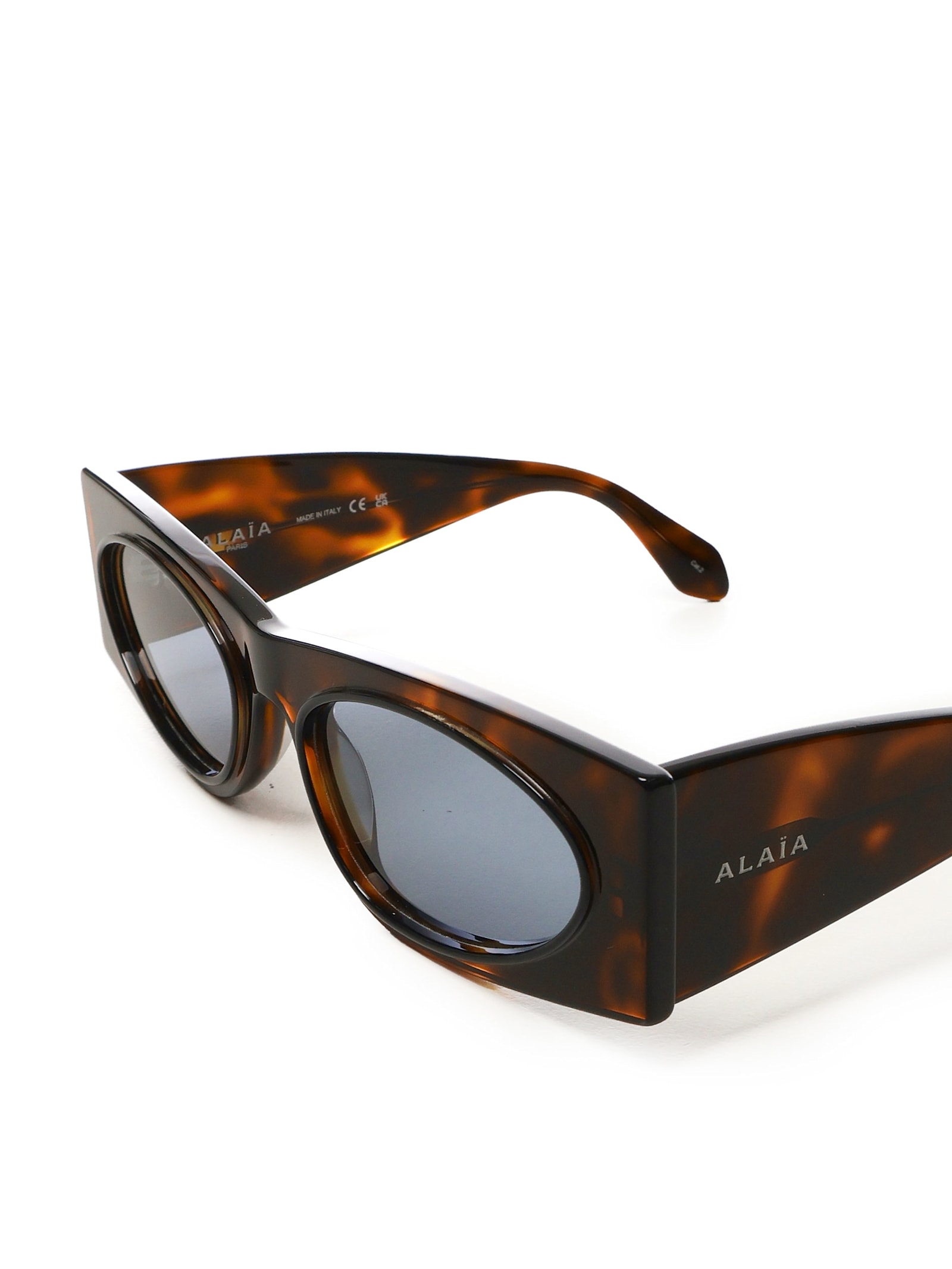 Shop Alaïa Tortoiseshell Sunglasses In Brown