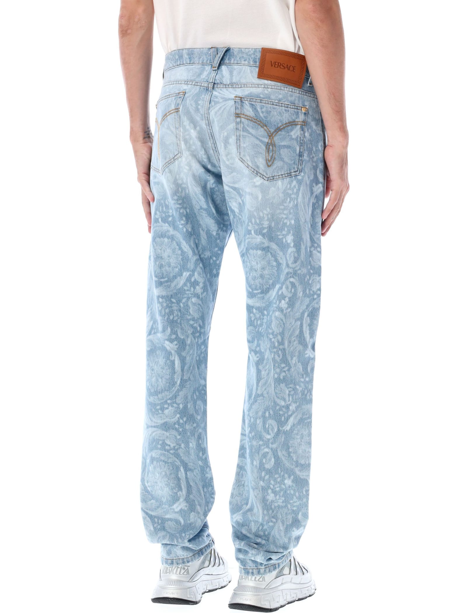 Shop Versace Allover Jeans In Light Blue