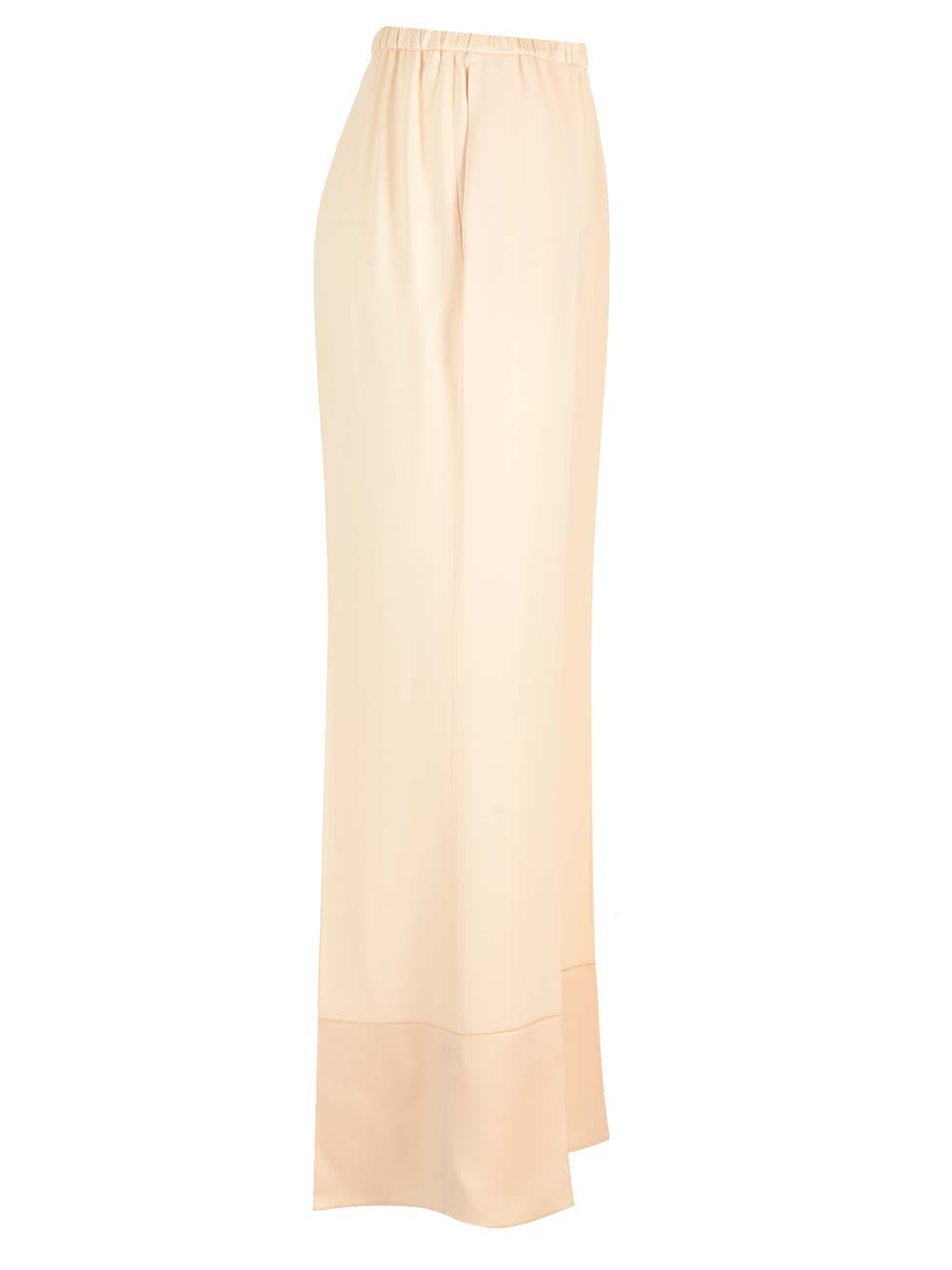 Shop Forte Forte Envers Satin Flared Pants In White