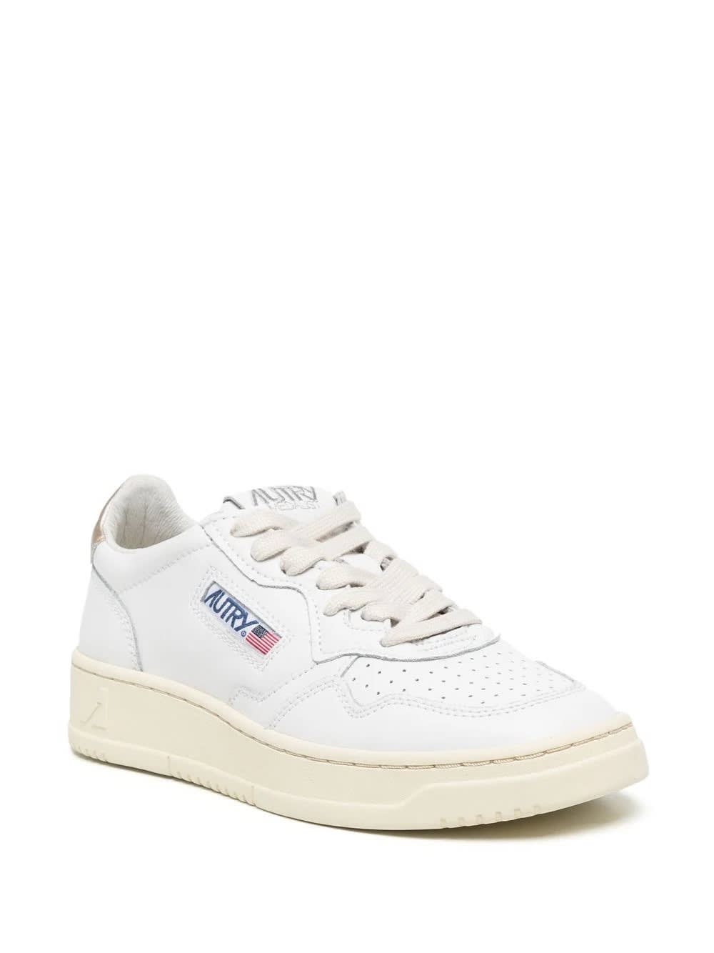 Shop Autry Medalist Low Sneakers In White And Gold Leather