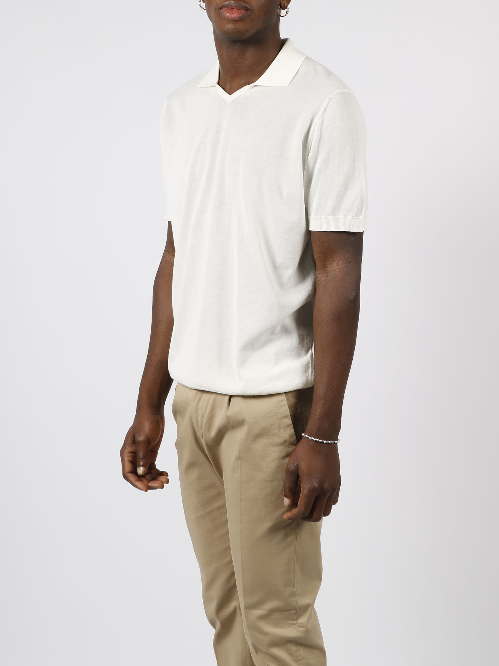 Shop Drumohr Buttonless Cotton Polo Shirt In White
