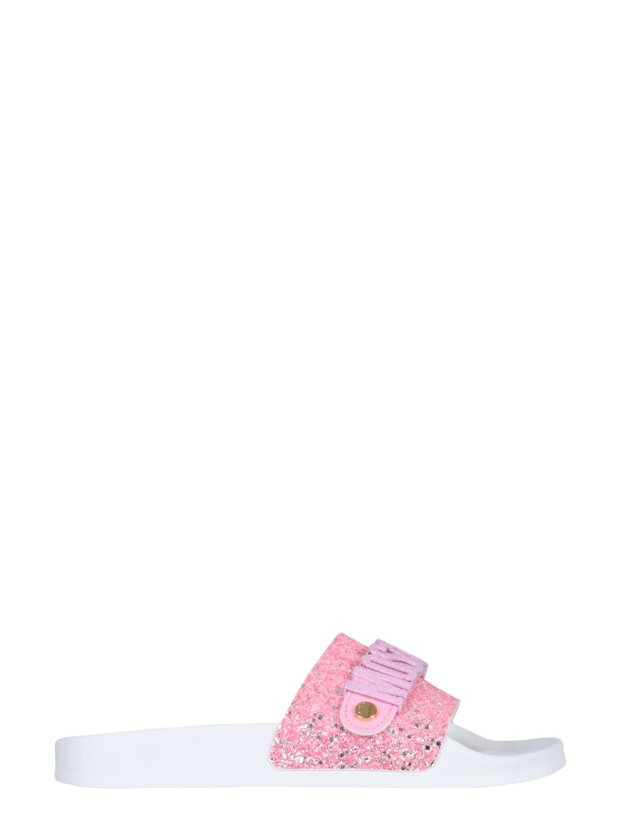 Shop Moschino Lettering Logo Slide Sandals In Pink