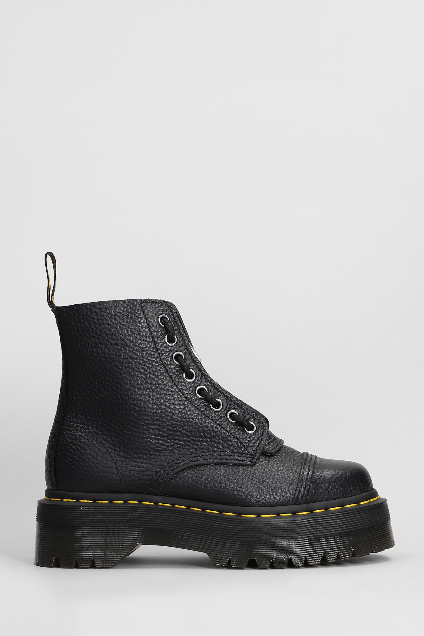 Dr. Martens Sinclair Combat Boot In Black Hammered Leather With A Large Treaded Sole In Animal Print