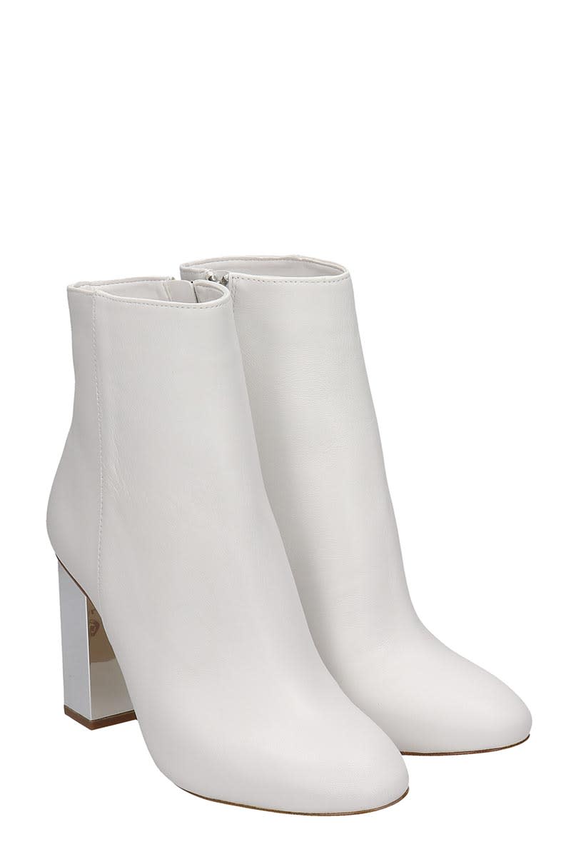 white michael kors boots