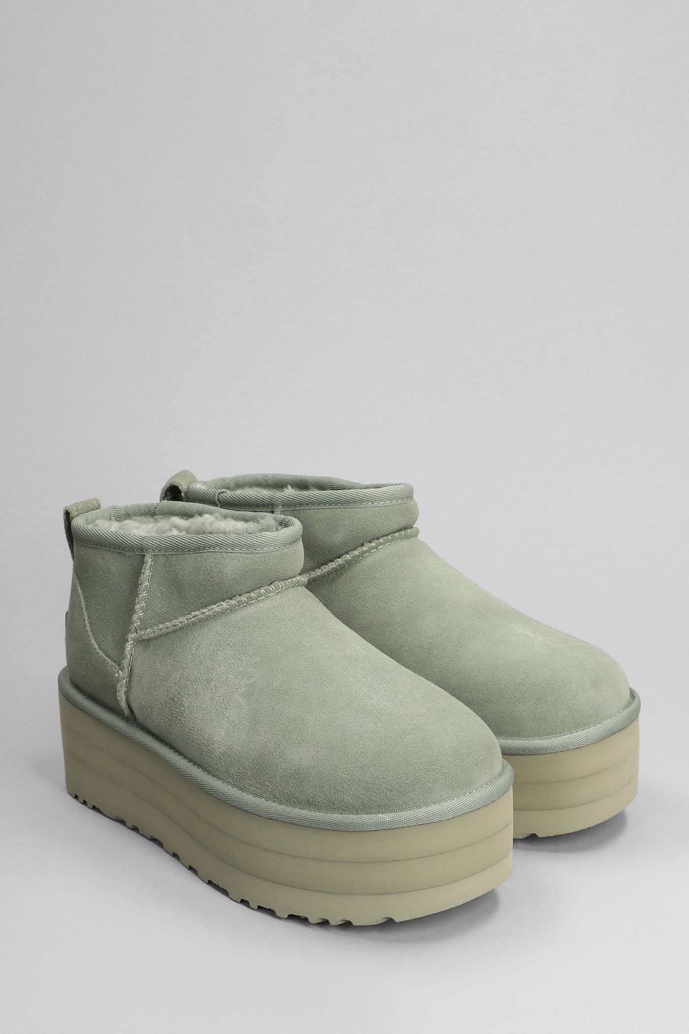 Shop Ugg Classic Ultra Mini P Low Heels Ankle Boots In Green Suede
