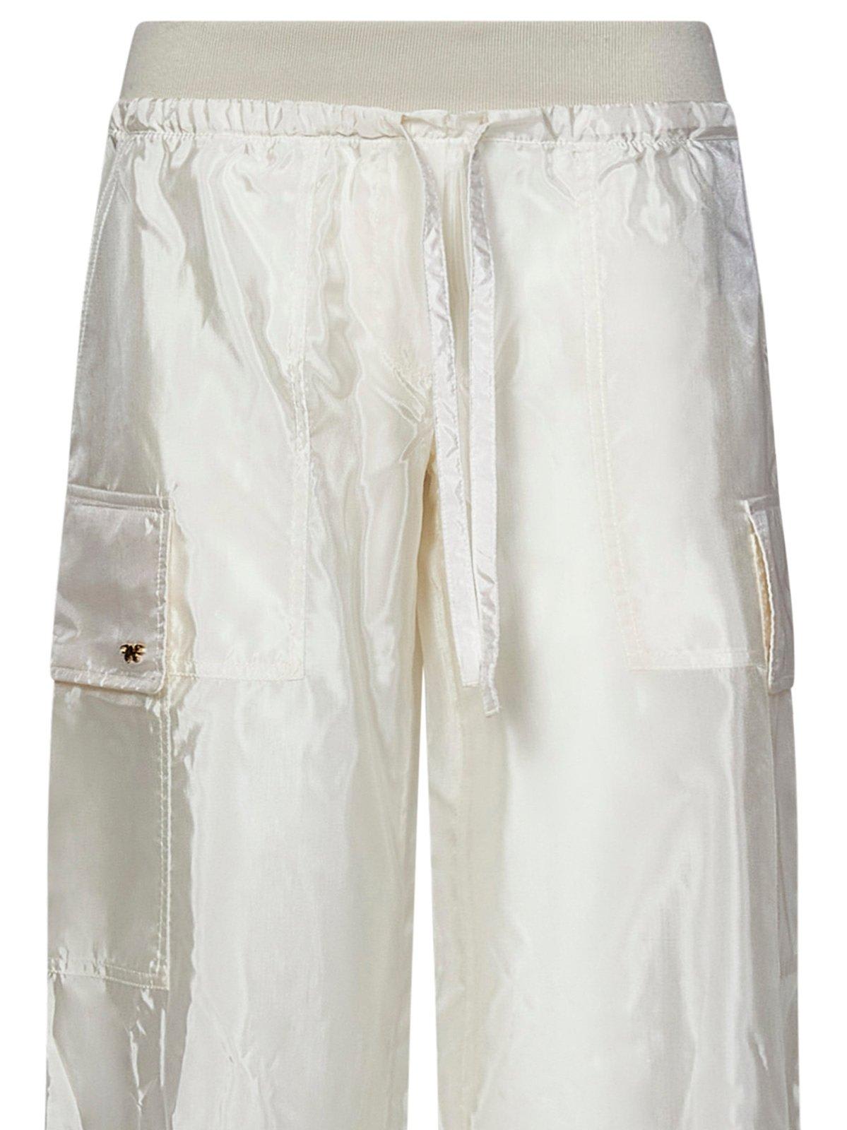 Shop Palm Angels High-shine Satin Parachute Trousers In White