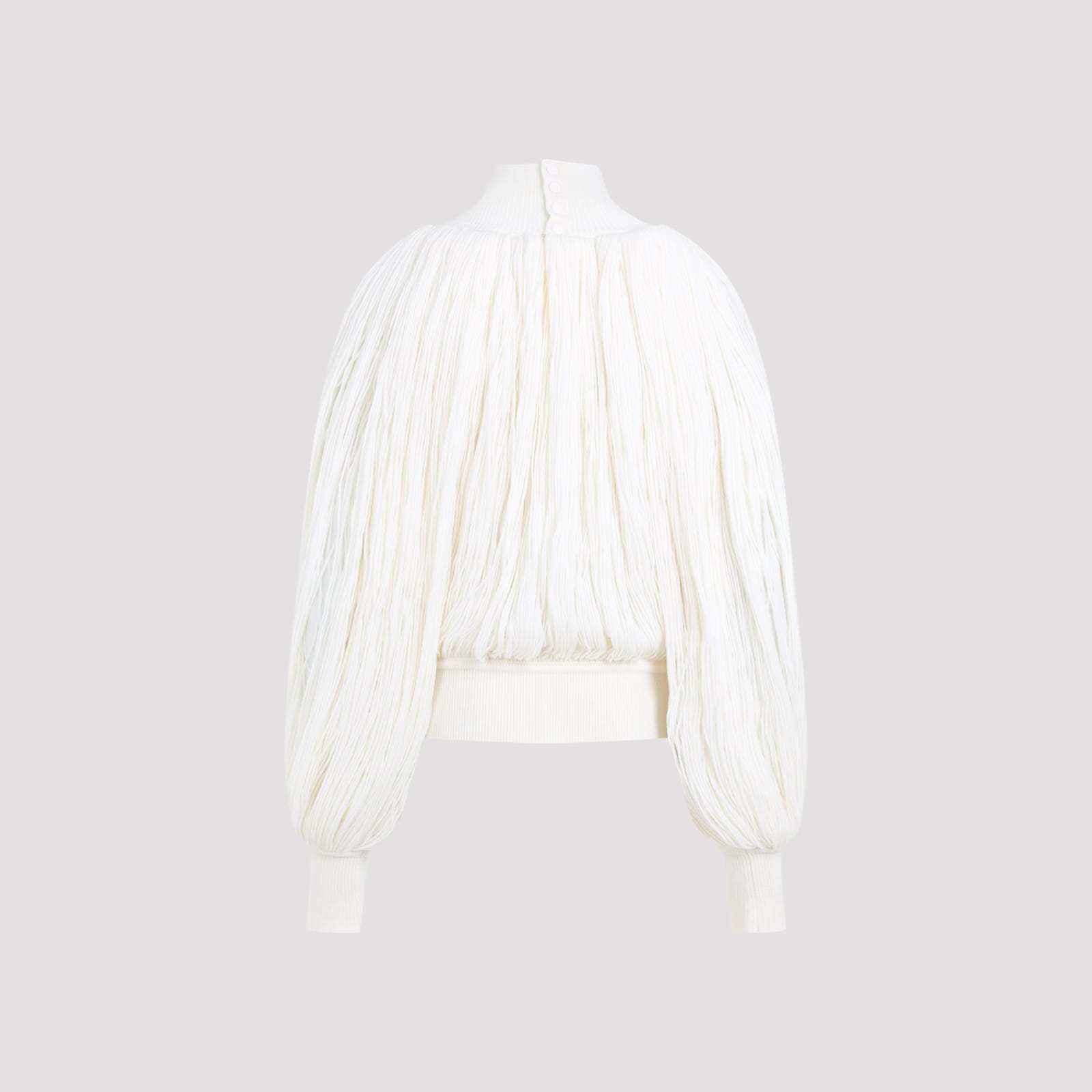 Alaïa Fringed Yarn Knit Merino Wool Top In Blanc Casse