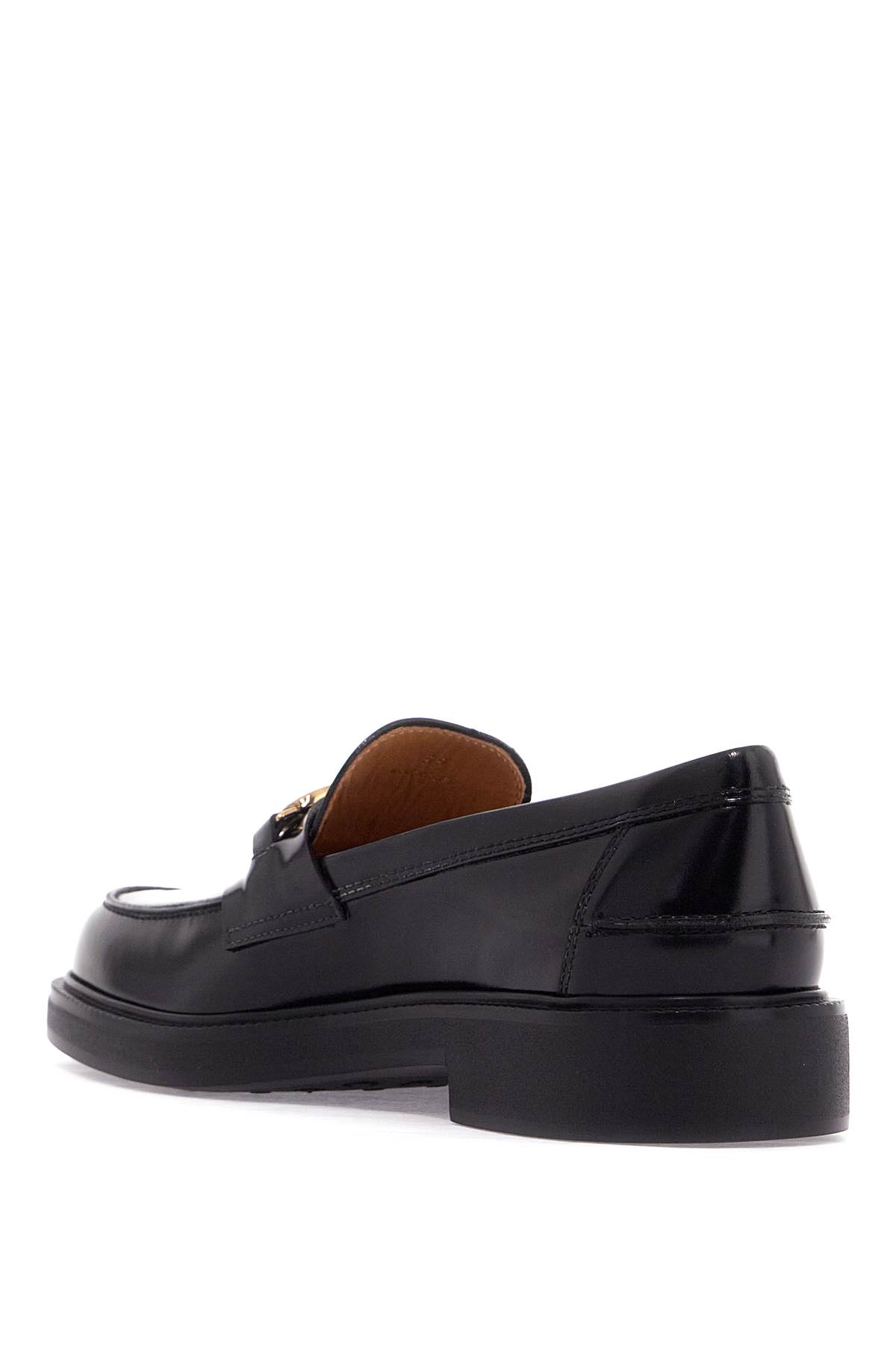 Shop Tod's Metal Logo Loafers With Metal Detailing In Nero (black)