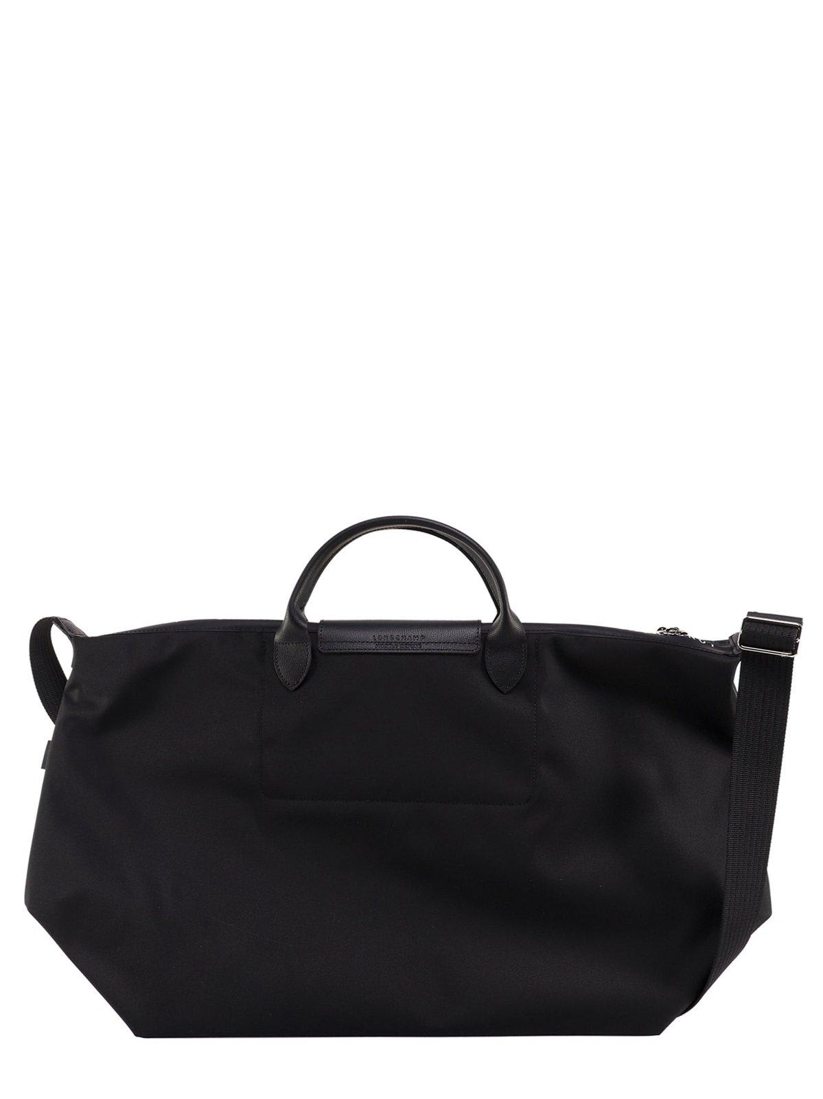 Shop Longchamp Le Pliage Logo Embossed Zipped Shoulder In Black