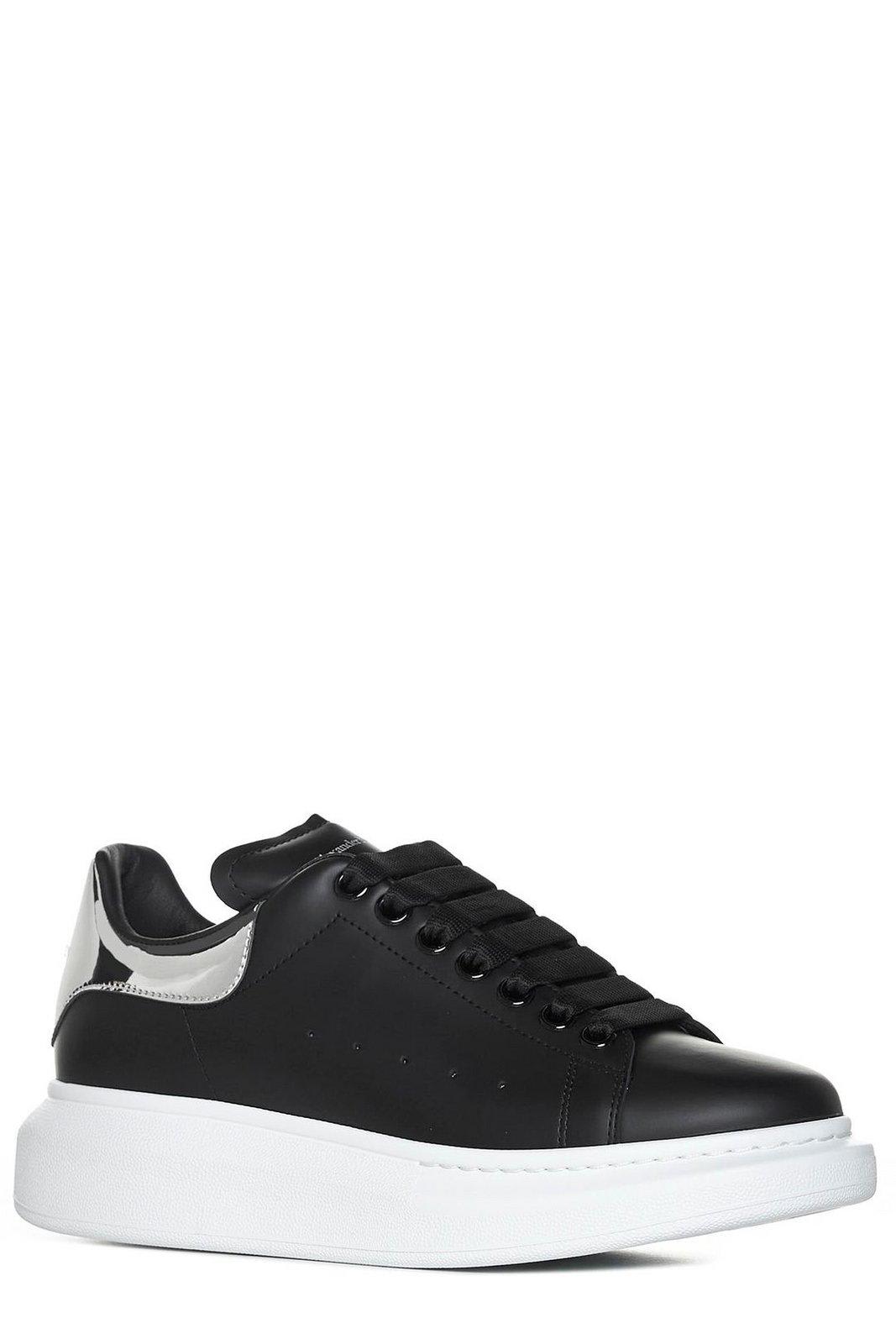 Shop Alexander Mcqueen Round Toe Laced Sneakers In Black