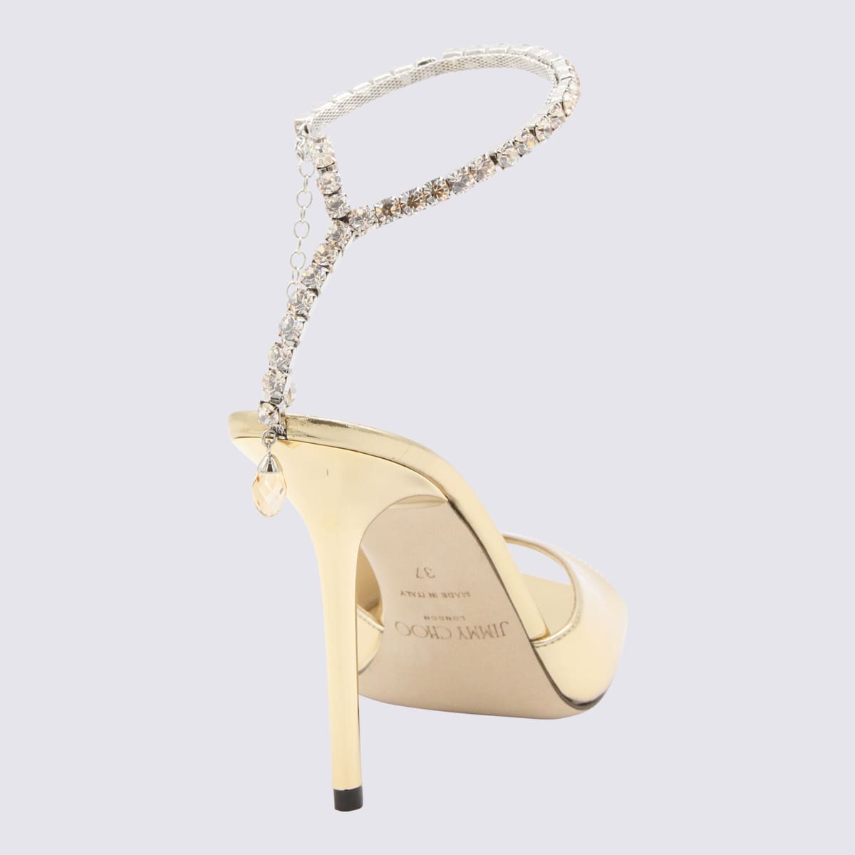 Shop Jimmy Choo Gold-tone Leather Saeda Sandals In Gold/crystal Honey