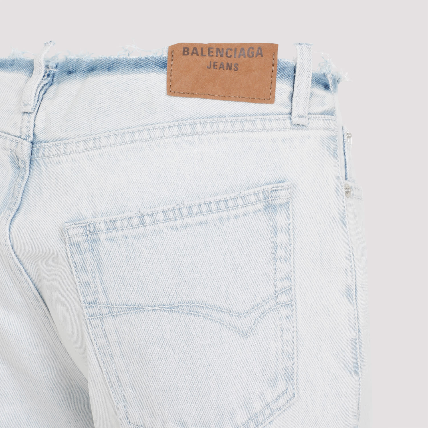 BALENCIAGA CUT OFF WAISTBAND JEANS 