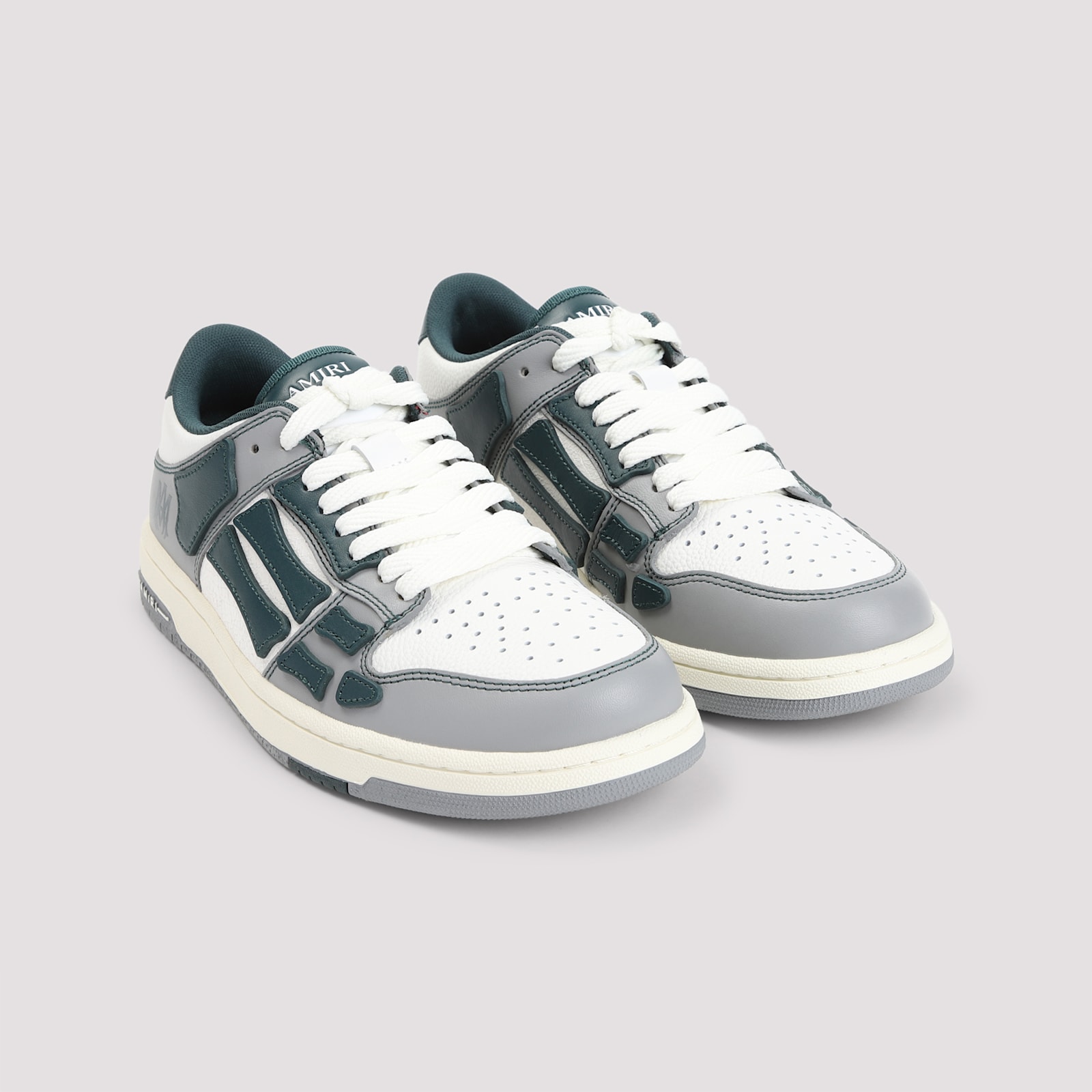 Amiri Skel Top Low Grey Sneakers With Logo Patch On Thetongue And Contrasting Details On The Side In Leath In Gray