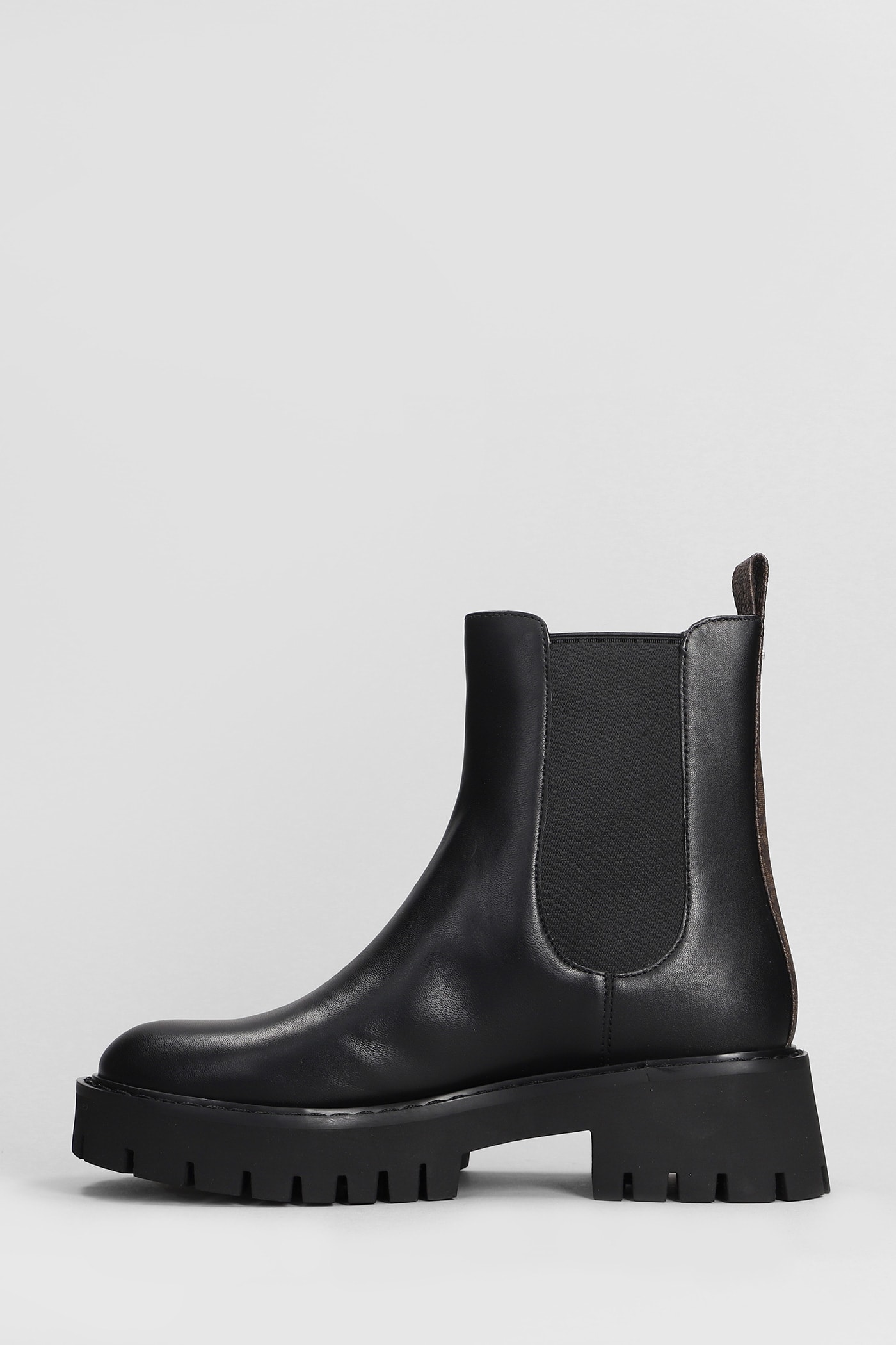 Shop Michael Kors Asher Flat Bootie Combat Boots In Black Leather