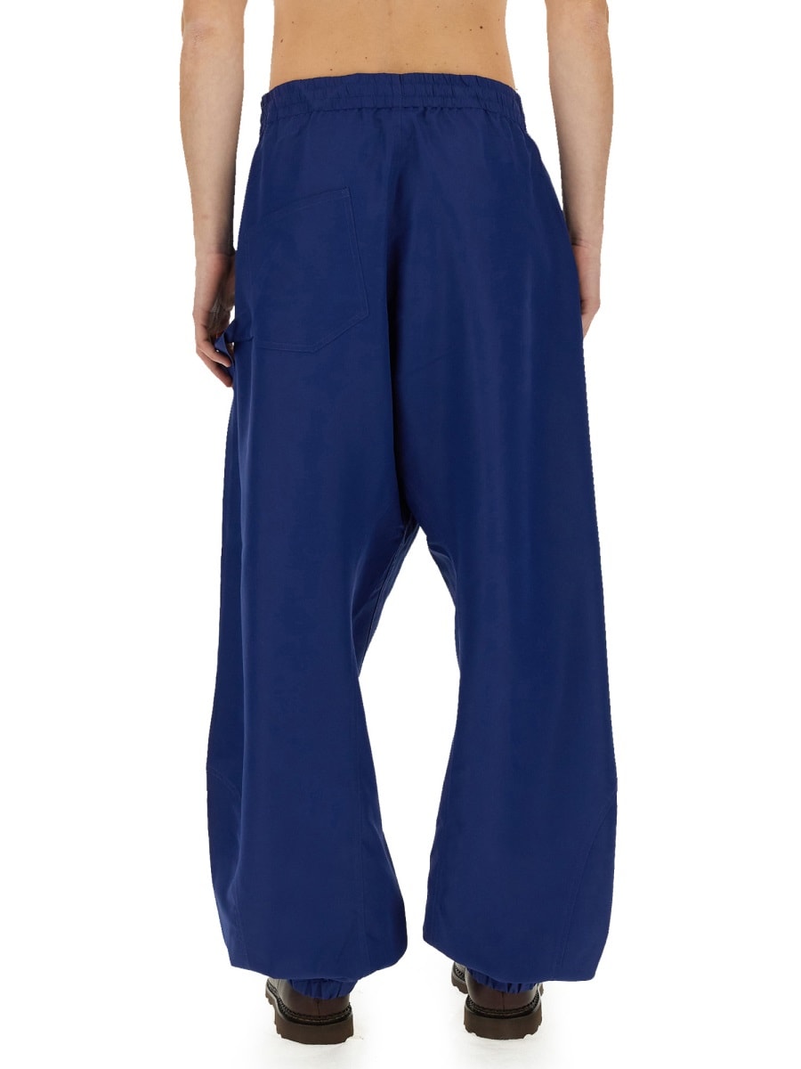 Shop Jw Anderson Joggers Pants With Logo Anchor In Airforce Blue