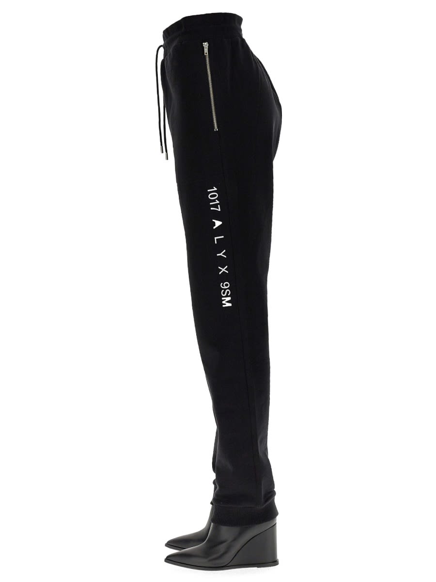 Shop Alyx Jogging Pants Visual In Black