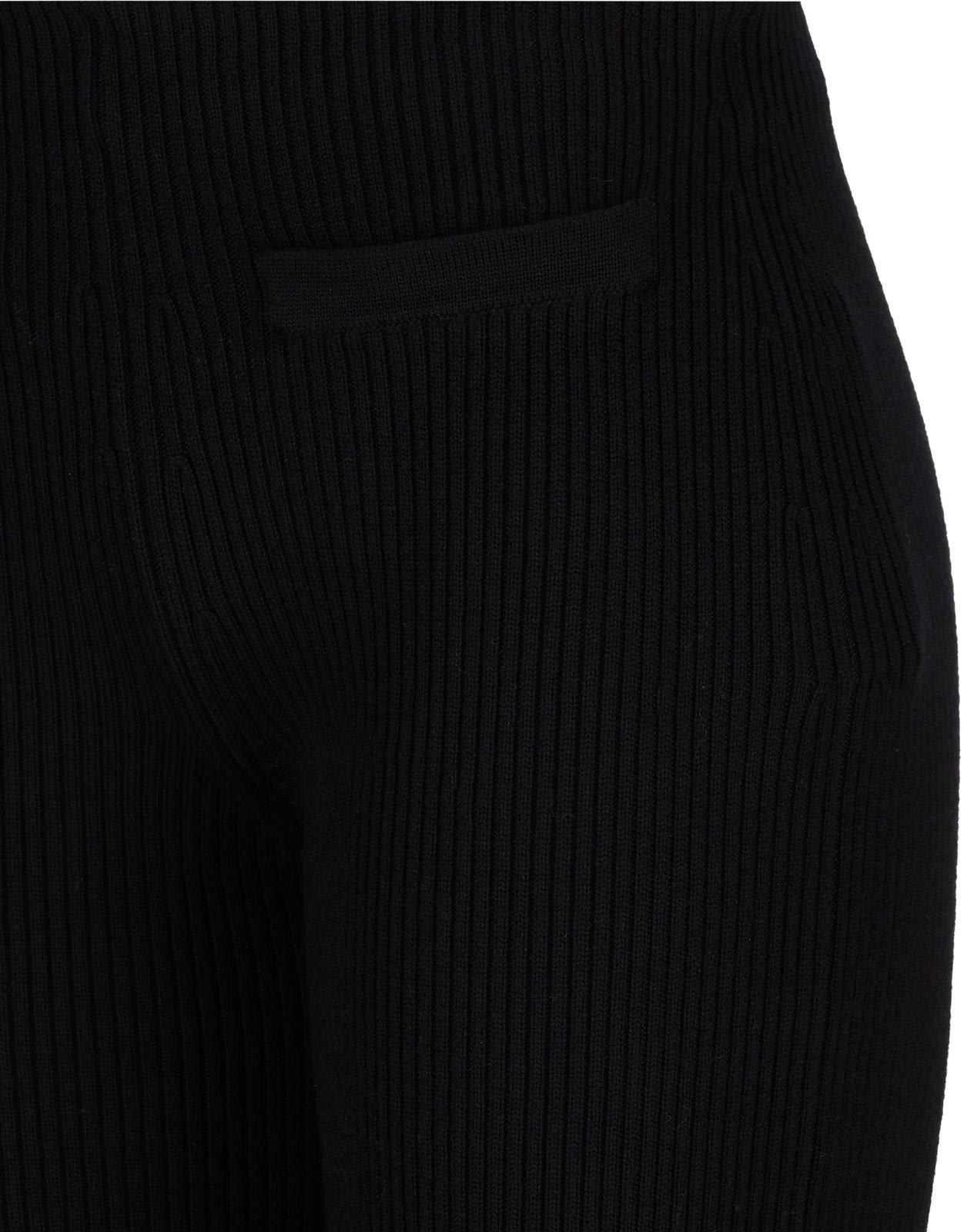 Shop Saint Laurent Low Waisted Ribbed Flared Pants In Black