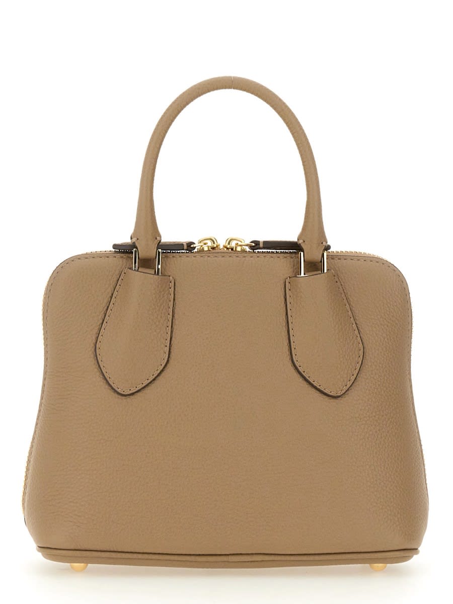 Shop Tory Burch Mini Swing Bag In Beige