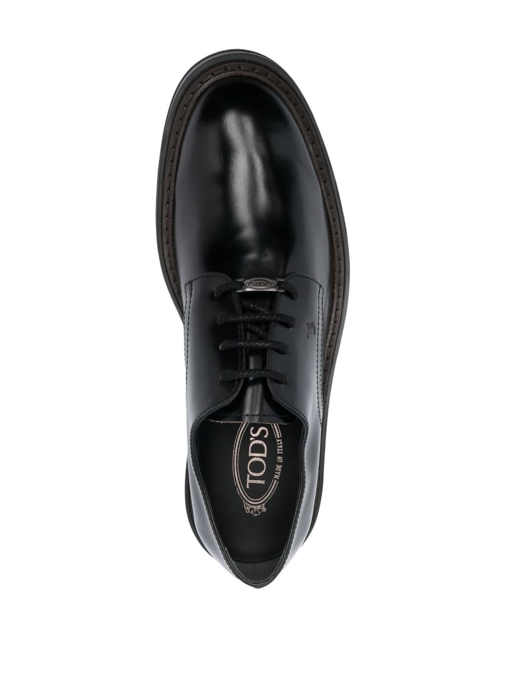 Shop Tod's Derbies In Black