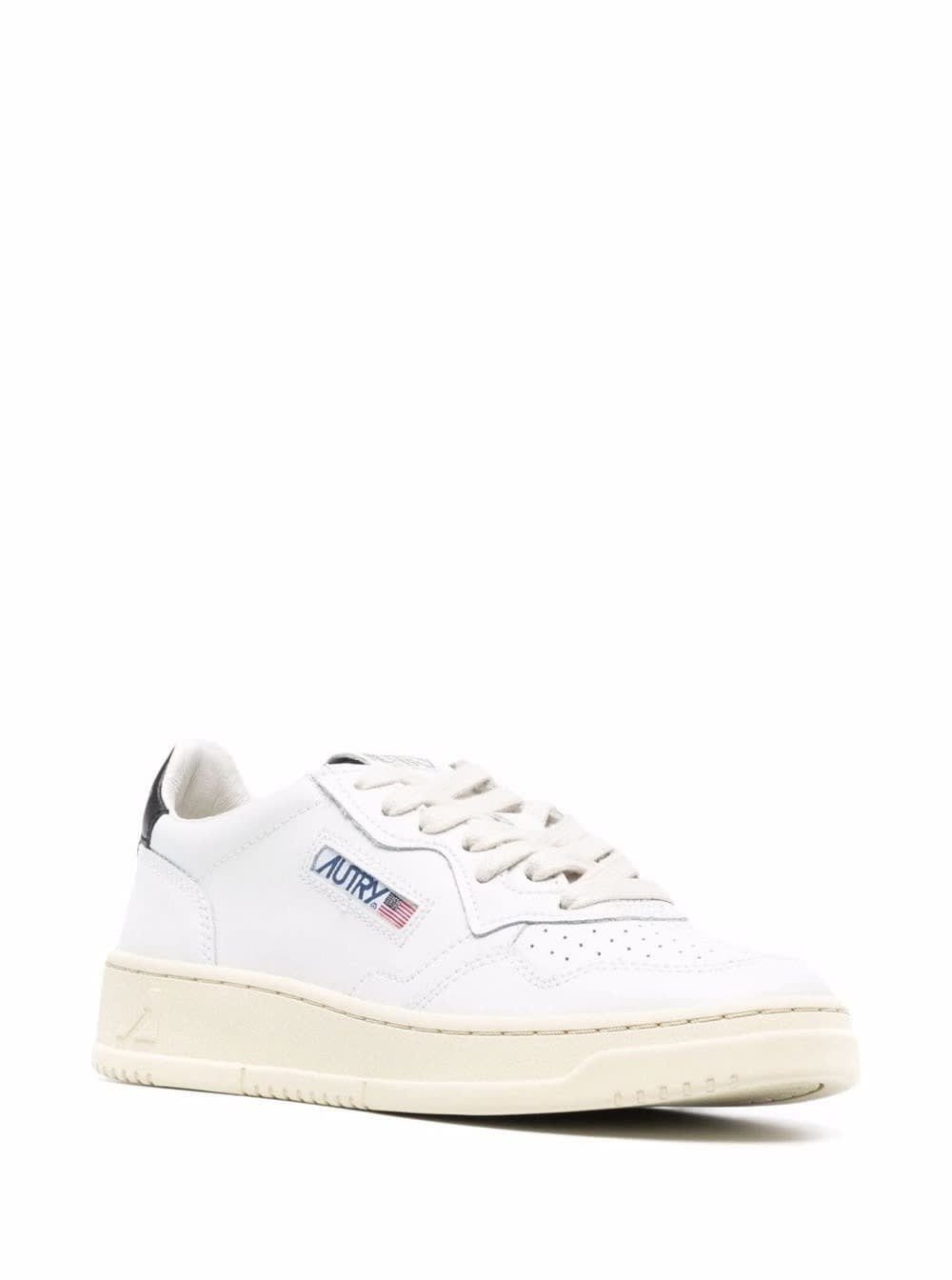 Shop Autry Womans White Leather Sneakers With Black Heel Tab