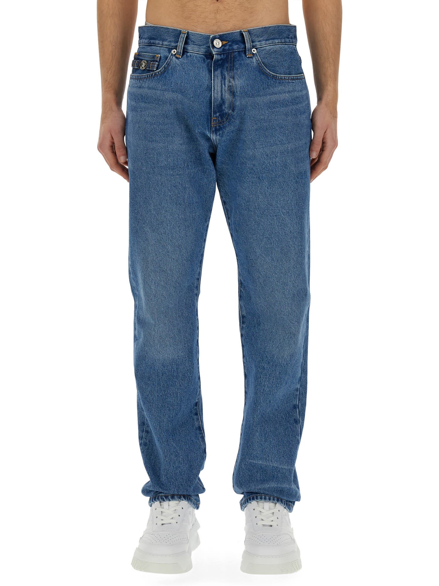 Shop Versace Regular Fit Jeans In Clear Blue