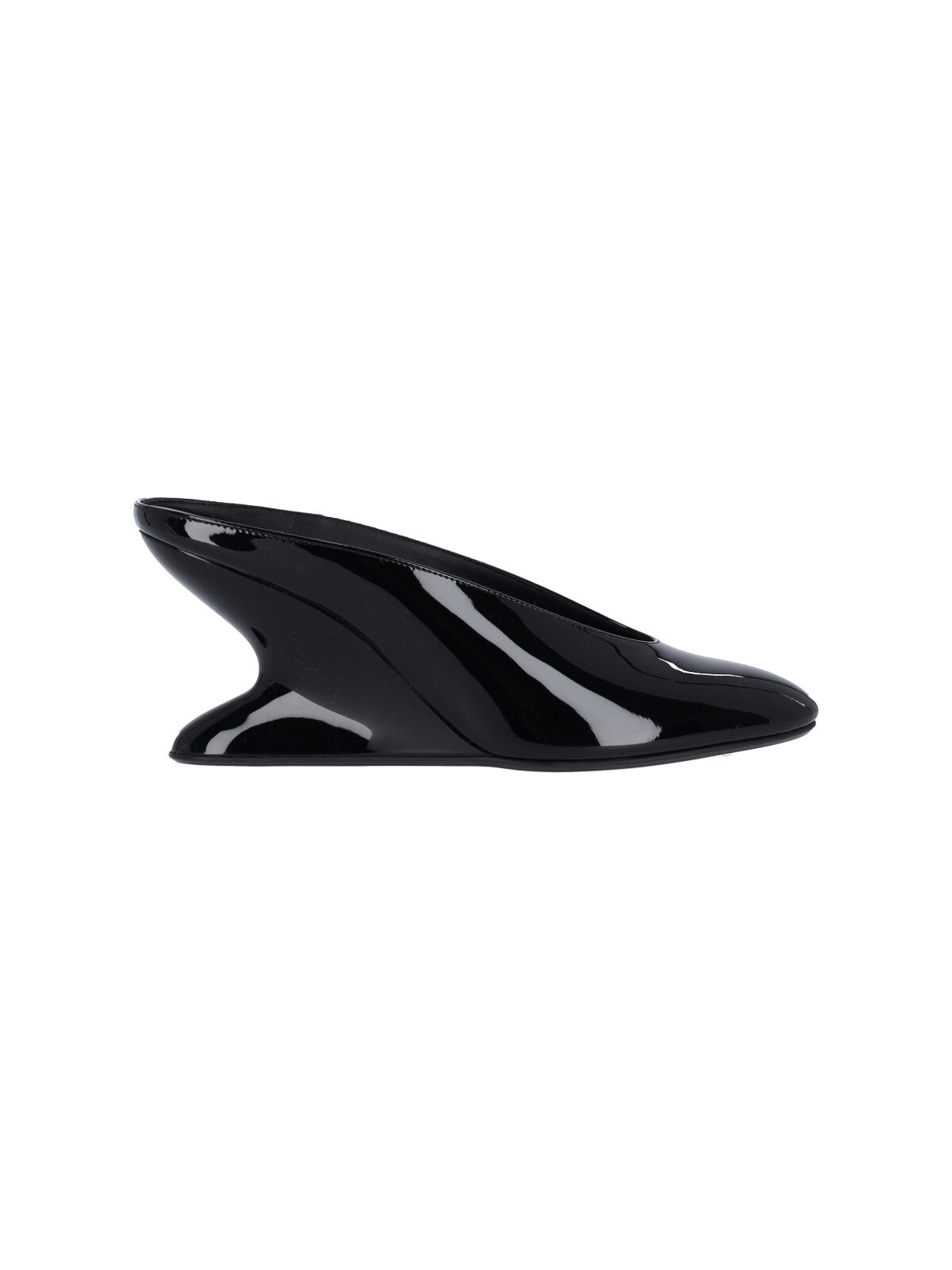 Shop Alaïa Mules With Curved Wedges