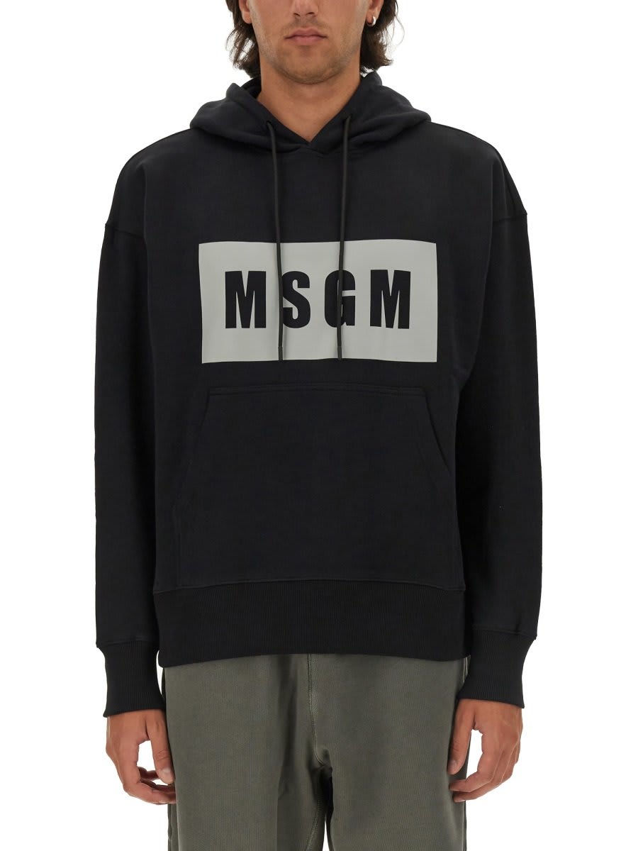 Shop Msgm Logo Printed Drawstring Hoodie In Black