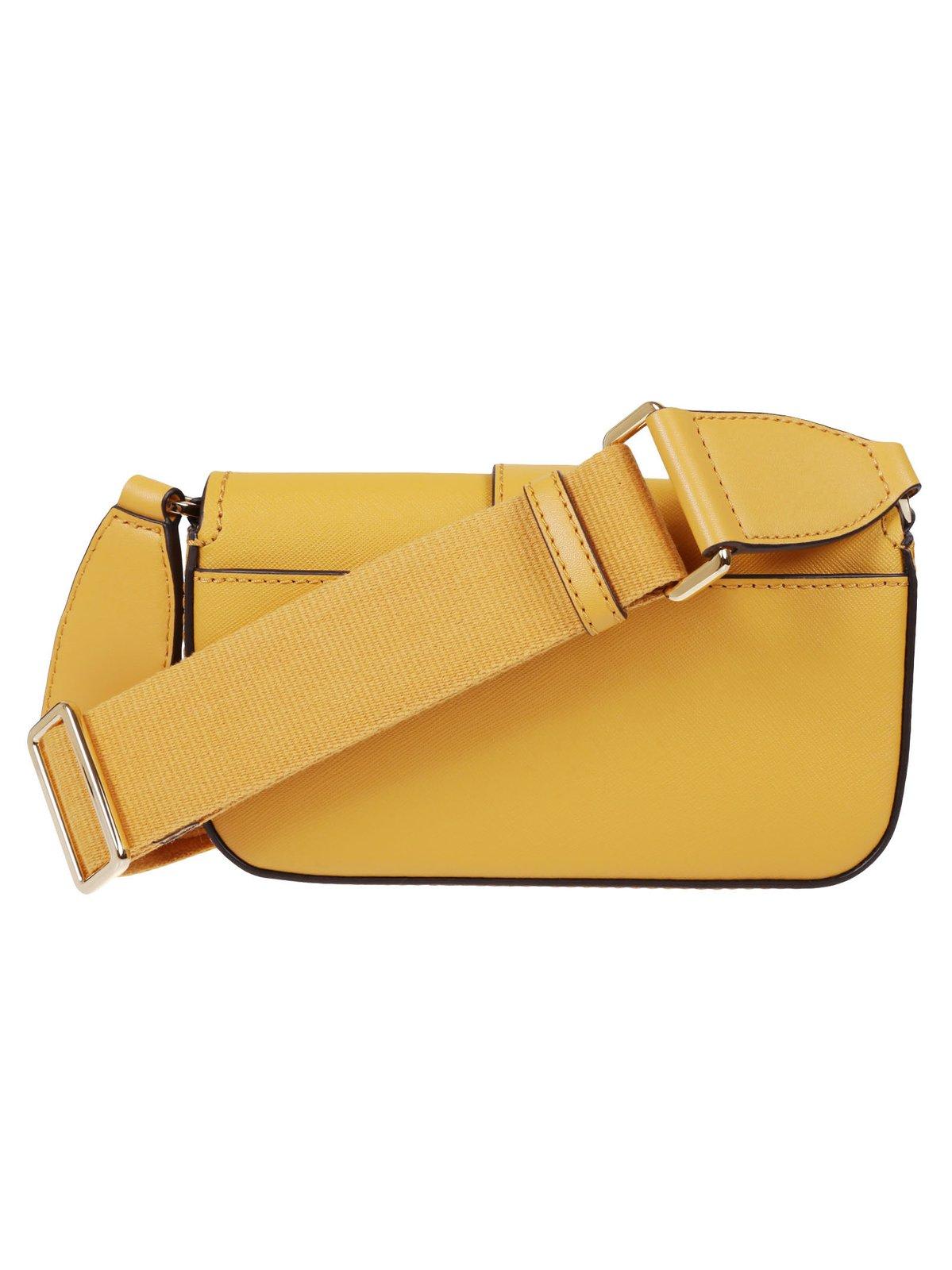 Shop Michael Kors Michael Greenwich Extra-small Sling Crossbody Bag In Golden Rod