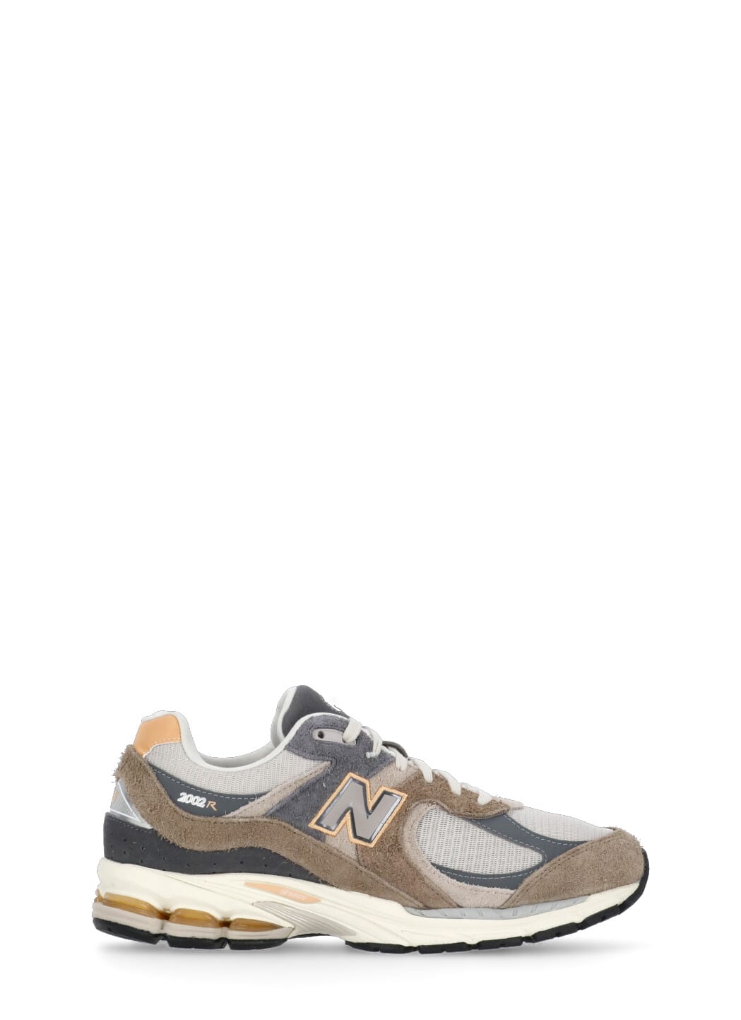 Shop New Balance 2002r Sneakers In Brown