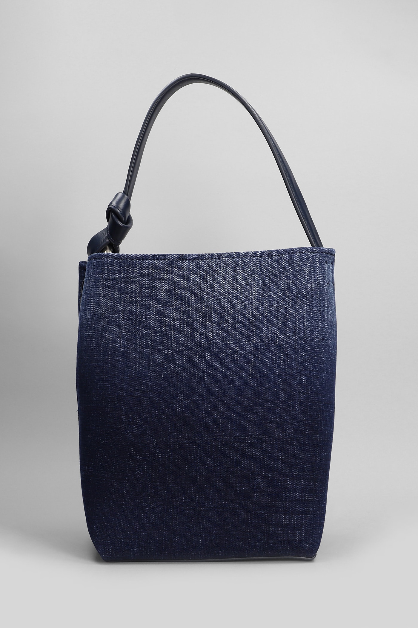 JW ANDERSON CORNER HAND BAG IN BLUE COTTON