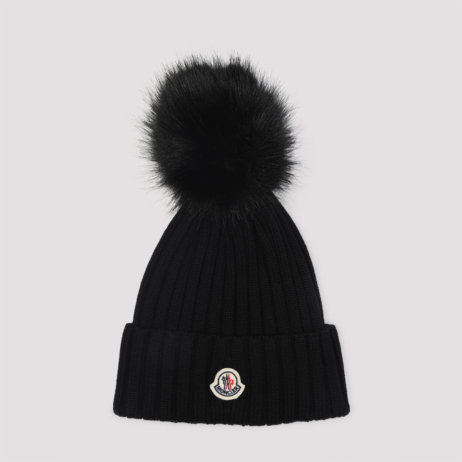 Moncler Ribbed Knit Wool Beanie With Faux Fur Pom-pom In Black